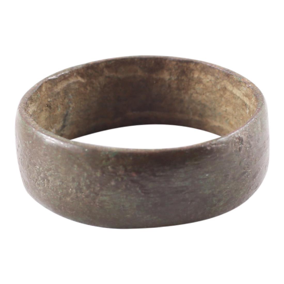 Viking Man's Wedding Ring, 850-1050: Item: Viking Man's Wedding Ring Date: 850-1050 AD Material: Bronze Size: 7.75 Broad band with shallow rounded face. Vikings exchanged rings on the pommel of the groom’s sword. All items purchased ar