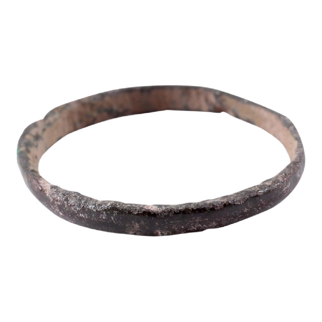 Viking Woman's Wedding Ring, 850-1050: Item: Viking Woman's Wedding Ring Date: 850-1050 AD Material: Bronze Size: 6.5 Narrow band with rounded face. Vikings exchanged rings on the pommel of the groom’s sword. All items purchased are acco