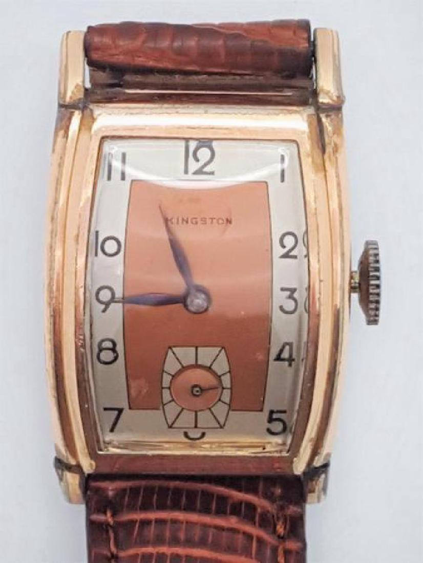 Vintage Kingston Swiss Rose Gold Men's Wrist Watch: Watch: Vintage Kingston Swiss Rose Gold Men's Wrist Watch Mechanical winding Movement: 17 jewels unadjusted Metal: 10K rose gold filled bezel, stainless steel back Dial: Two tone salmon art deco Arabi