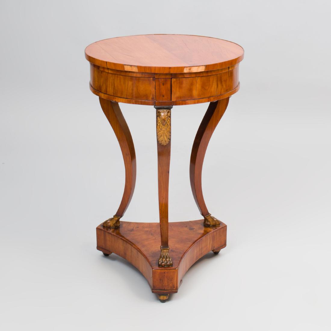 Biedermeier Cherry and Parcel-Gilt Side Table: 31 1/2 x 21 in. diam.