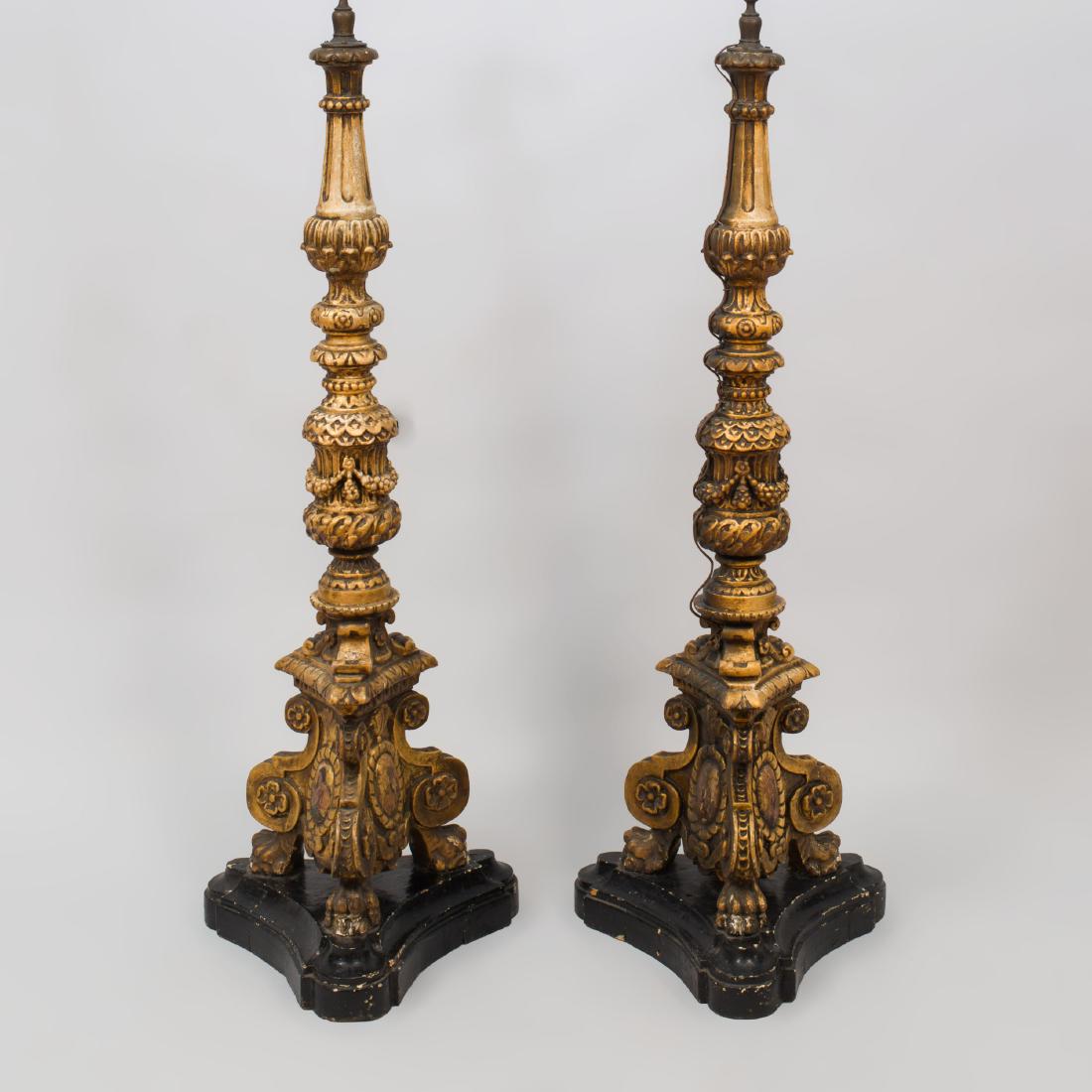 Pair of Baroque Style Carved Giltwood Floor Lamps:  60 x 18 x 18 in. Property from the Collection of Lynne and Armin Allen