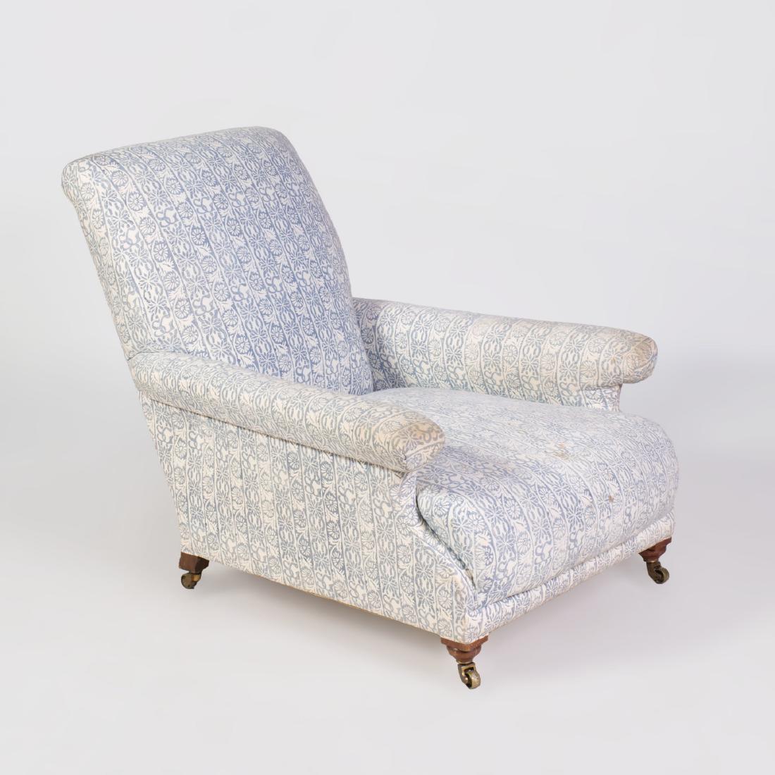 English Upholstered Club Chair, Howard & Co.: English Upholstered Club Chair, Howard & Co. Upholstered in printed cotton with the initials SG for Susan Gutfreund, raised on brass casters, stamped 'Howard & Sons, Ltd., London', stamped on the back