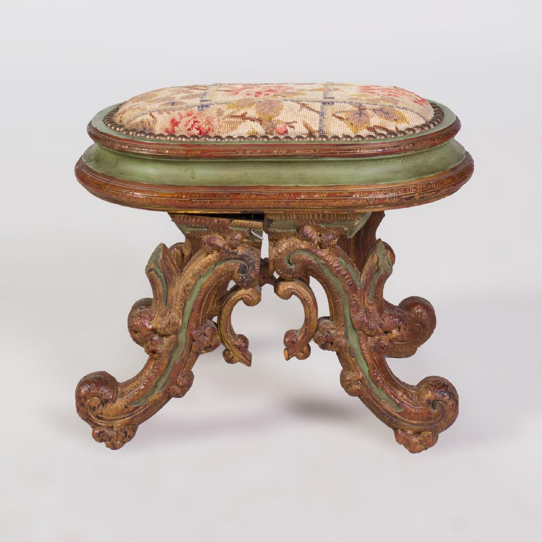 Italian Rococo Style Painted and Parcel-Gilt Stool: Italian Rococo Style Painted and Parcel-Gilt Stool Upholstered in floral needlework. 12 1/2 x 16 x 10 1/2 in.