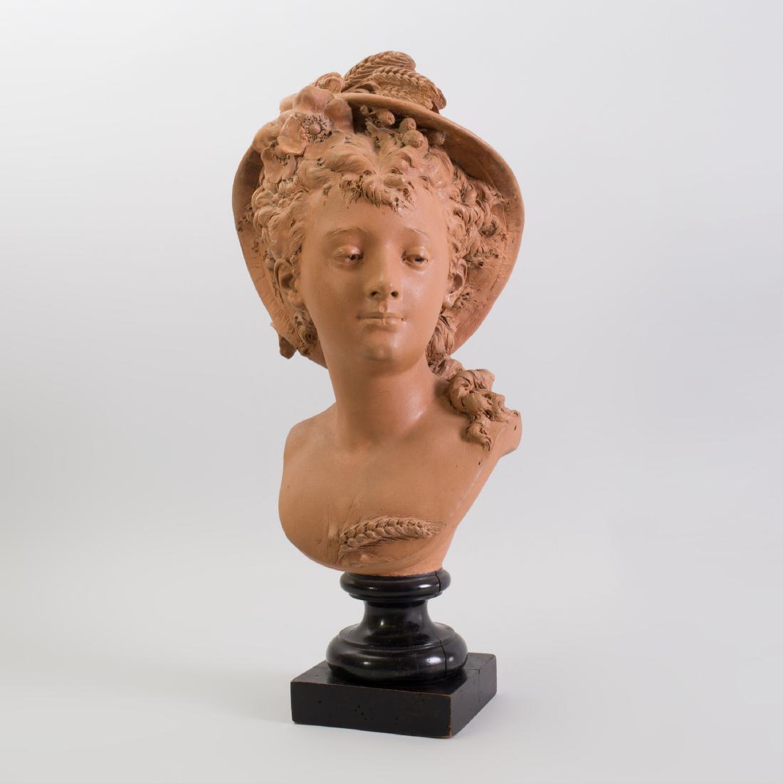 After Albert-Ernest Carrier-Belleuse (1824-1887):: After Albert-Ernest Carrier-Belleuse (1824-1887): Terracotta Bust of a Girl Inscribed 'A. Carrier-Belleuse', on stained wood stand. 24 x 11 in.