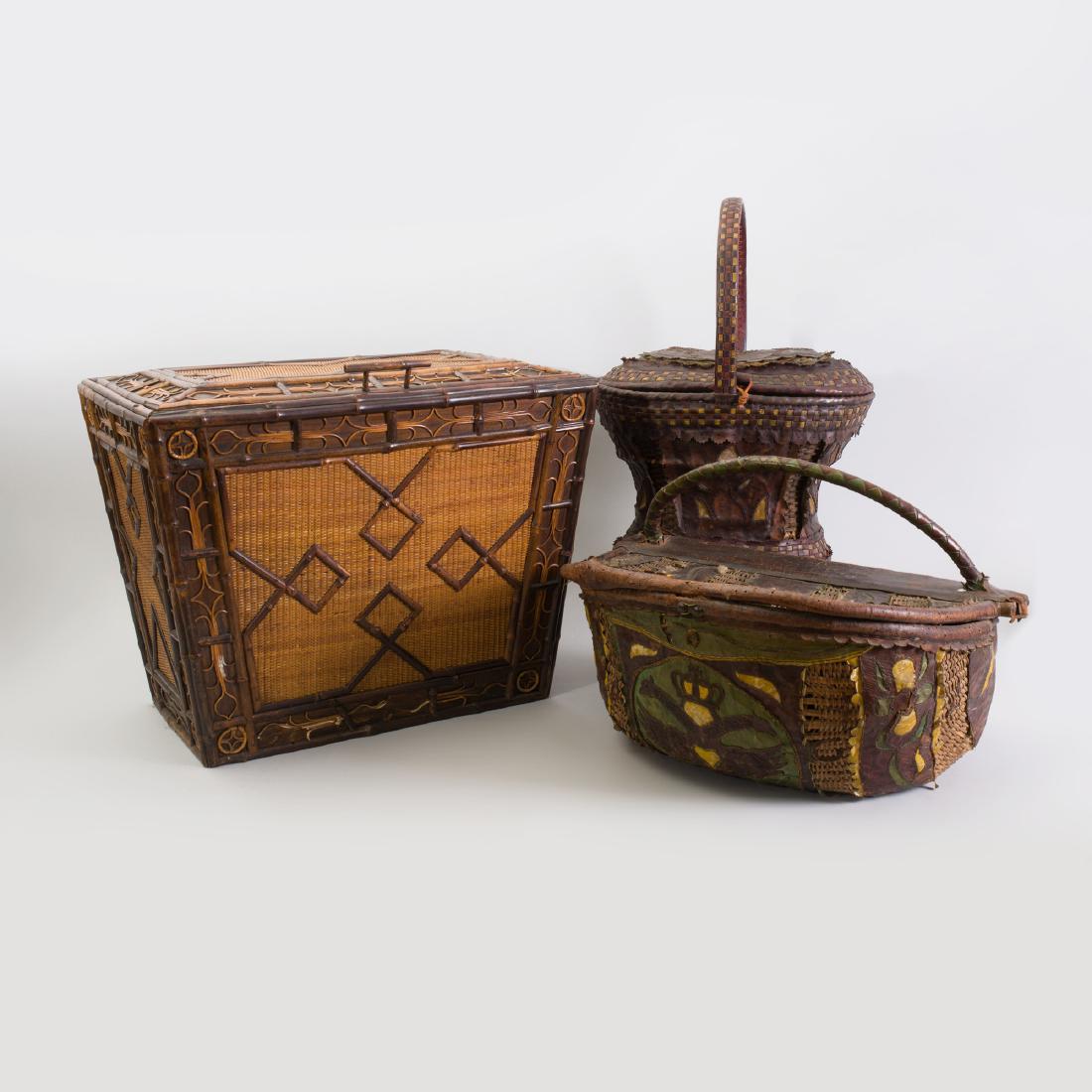 Two Austrian Leather-Mounted Baskets and a Wicker and: Two Austrian Leather-Mounted Baskets and a Wicker and Reed-Mounted Casket The leather-mounted baskets fitted with handles; the smaller with a fabric lining. Casket 17 1/4 x 22 x 15 in.