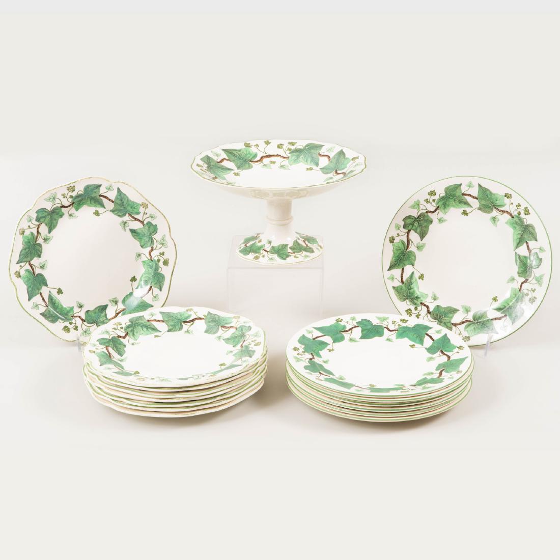 Wedgwood Transfer Printed and Enriched Creamware Part: Various impressed and printed marks. Comprising: A compote in the 'Empress Catherine' shape Eight lunch plates with lobed rims Seven circular lunch plates The circular lunch plates 9 1/4 in. d