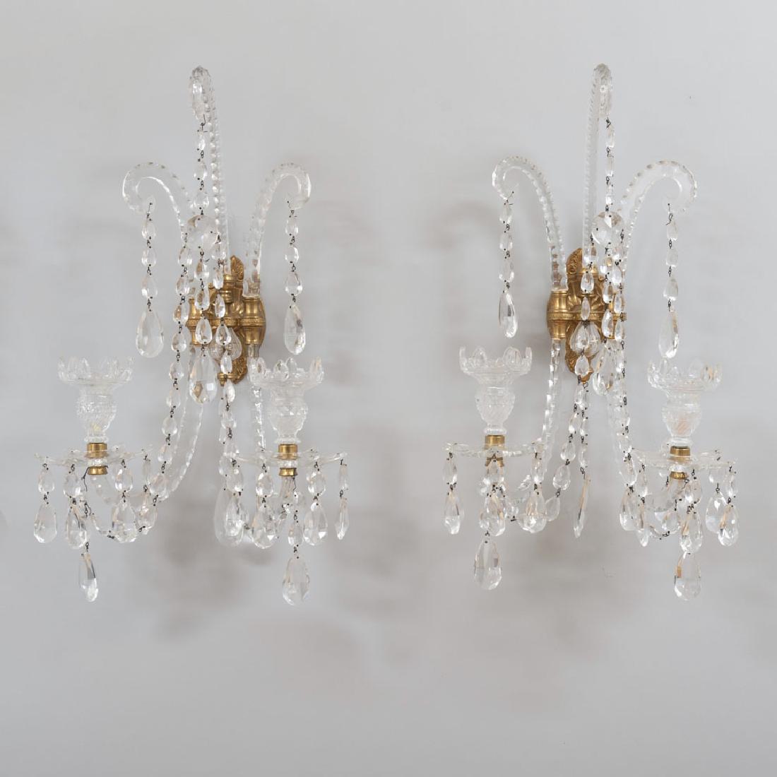Pair of English Cut Glass and Lacquered Brass Two-Light: Pair of English Cut Glass and Lacquered Brass Two-Light Wall Lights Together with two additional wall lights. 23 x 13 x 8 1/2 in. Property from the Collection of Melinda and Paul Sullivan, Eyrie Knoll