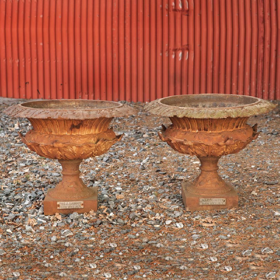Pair of Cast-Iron Garden Urns: Pair of Cast-Iron Garden Urns With a label for J.L. Mott. 16 x 22 in. diam. Property from the Collection of Melinda and Paul Sullivan, Eyrie Knoll, West Hartford, Connecticut