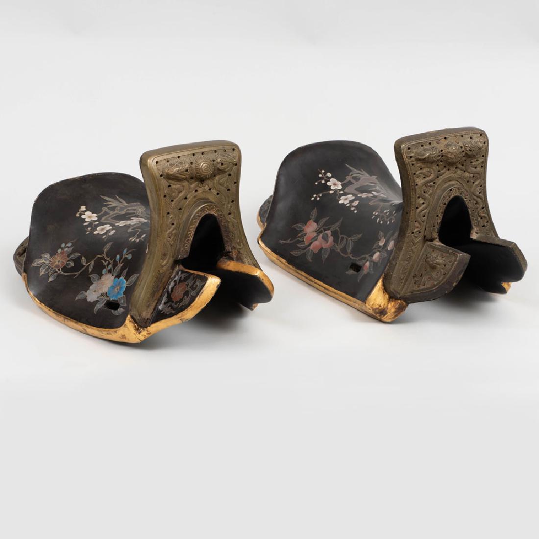Pair of Chinese Gilt-Metal Mounted Lacquer Ceremonial: Pair of Chinese Gilt-Metal Mounted Lacquer Ceremonial Saddles Each pommel and cantle plate modeled with dragons and flaming pearls. 10 1/4 x 22 x 12 1/4 in.