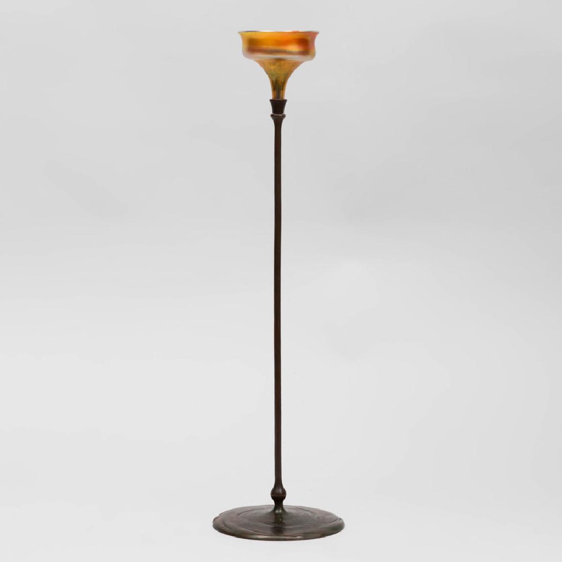 Tiffany & Co. Bronze and Favrile Glass Candlestick: Tiffany & Co. Bronze and Favrile Glass Candlestick Stamped to base, glass unmarked. 21 1/2 in. high. The Collection of Judith & Gerson Leiber