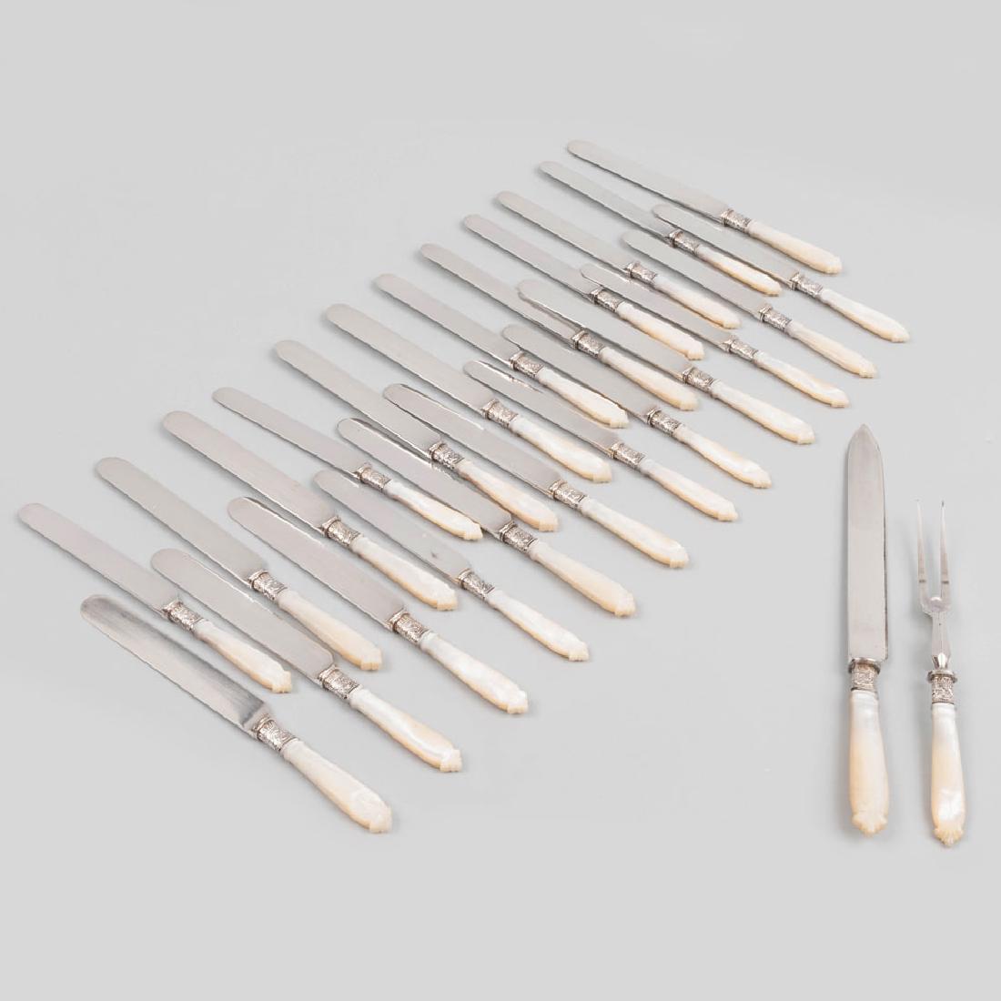 Set of Duhme & Co. Mother-of-Pearl Handle Knives: Set of Duhne & Co. Mother-of-Pearl Handle Knives Comprising: Twelve dinner knives with steel blades Twelve lunch knives with steel blades A carving set with steel blades and tines The dinner knives