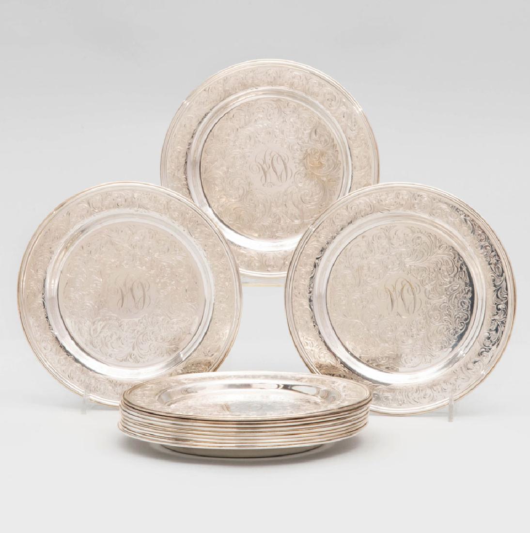 Twelve Towle Engraved Silver Bread Plates: Twelve Towle Engraved Silver Bread Plates Marked 'Sterling' and monogammed. 6 7/8 in. diam., 89 oz. approx. weight.