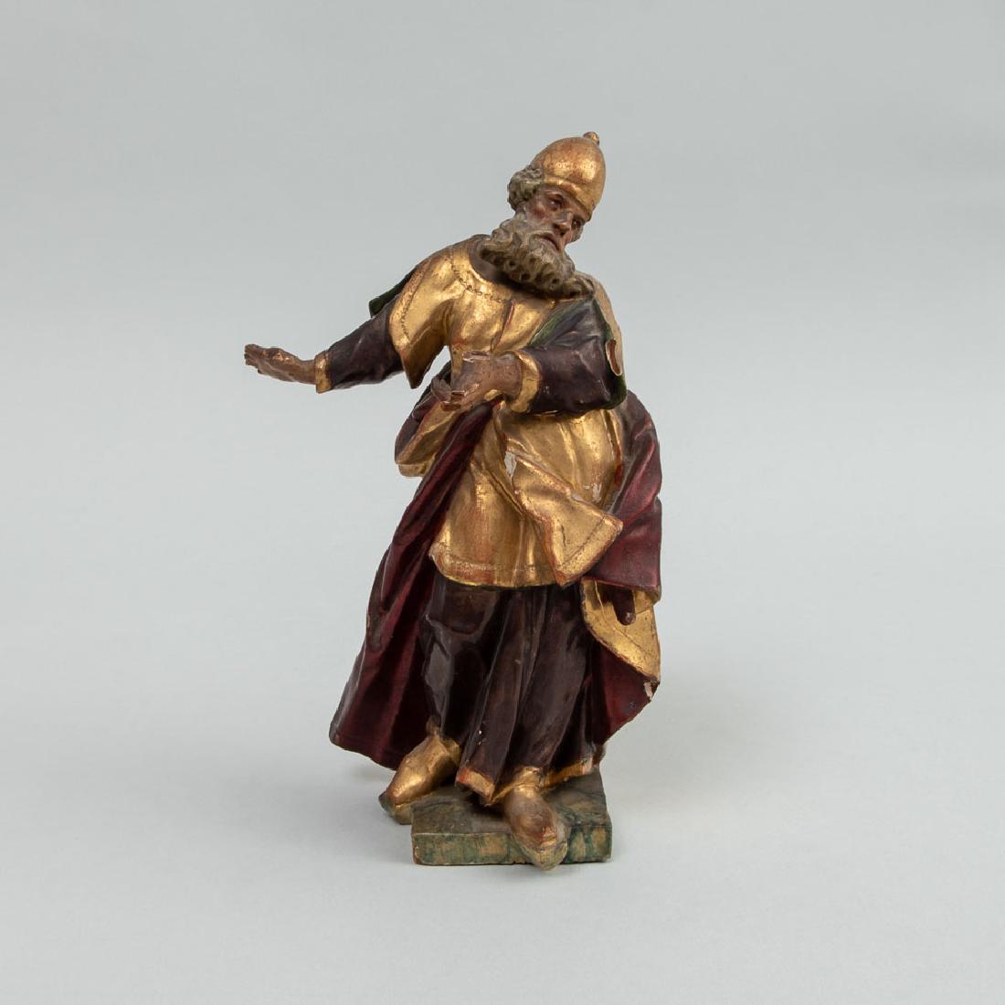 Continental Baroque Painted and Parcel-Gilt Crèche: Continental Baroque Painted and Parcel-Gilt Crèche Figure Wearing conical hat, on marbelized base; with later German stamp. 8 1/2 in. high. Property from a Private Connecticut Collection