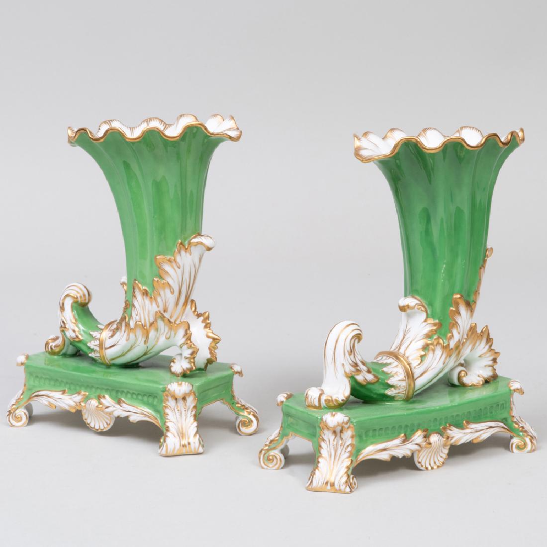 Pair of English Porcelain Apple Green Ground Cornucopia: Pair of English Porcelain Apple Green Ground Cornucopia Vases on Stands 8 1/2 in. high. Property from the Estate of William Kelly Simpson Estate of Lucy Truman Aldrich, 1955.