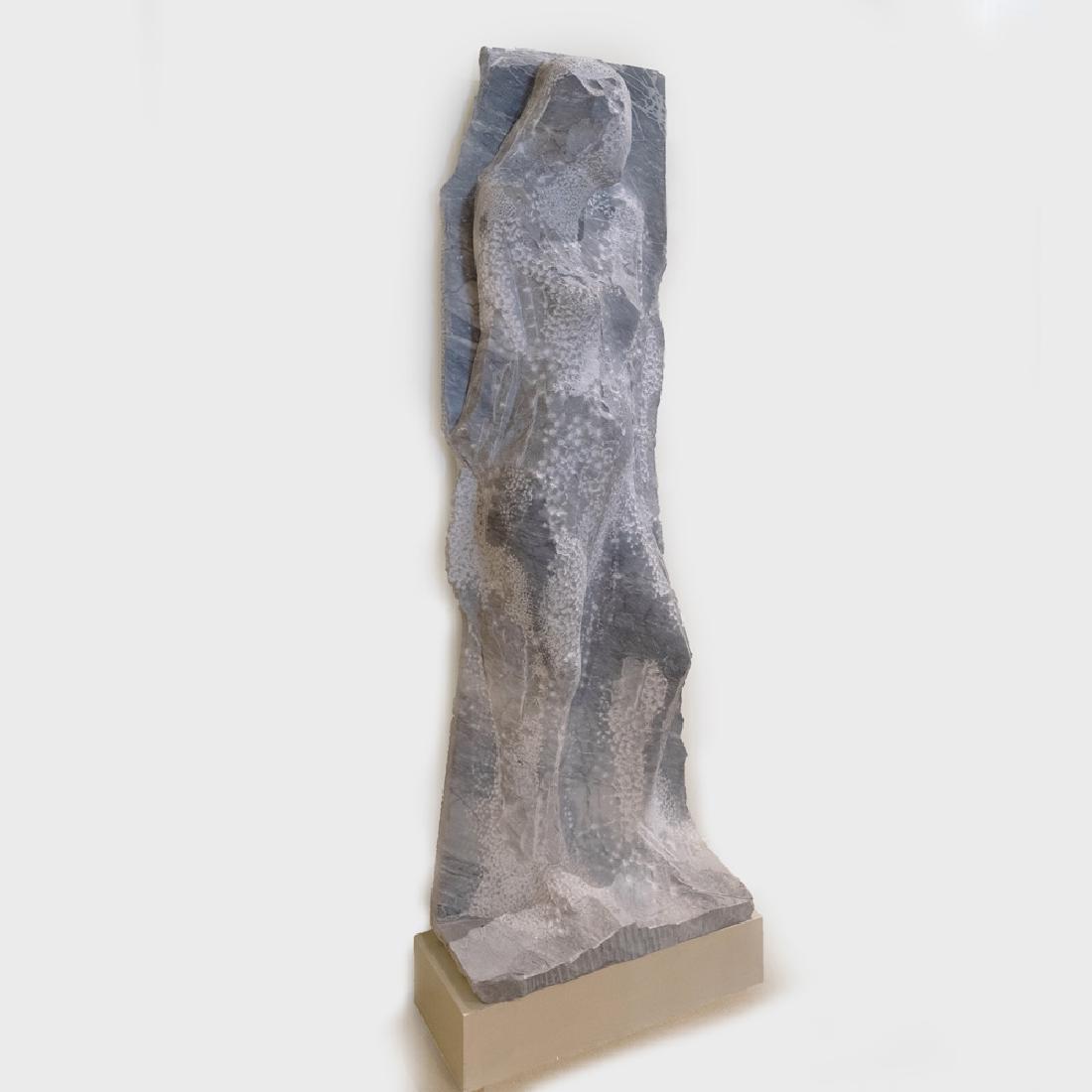 Manuel Neri (b. 1930): Mujer Pegada No. 3: Manuel Neri (b. 1930): Mujer Pegada No. 3 Grey marble, 1985, on a painted metal base. 68 1/2 x 23 x 10 in. Note: American artist Manuel Neri is a member of the 'second generation' Bay Area Figurative