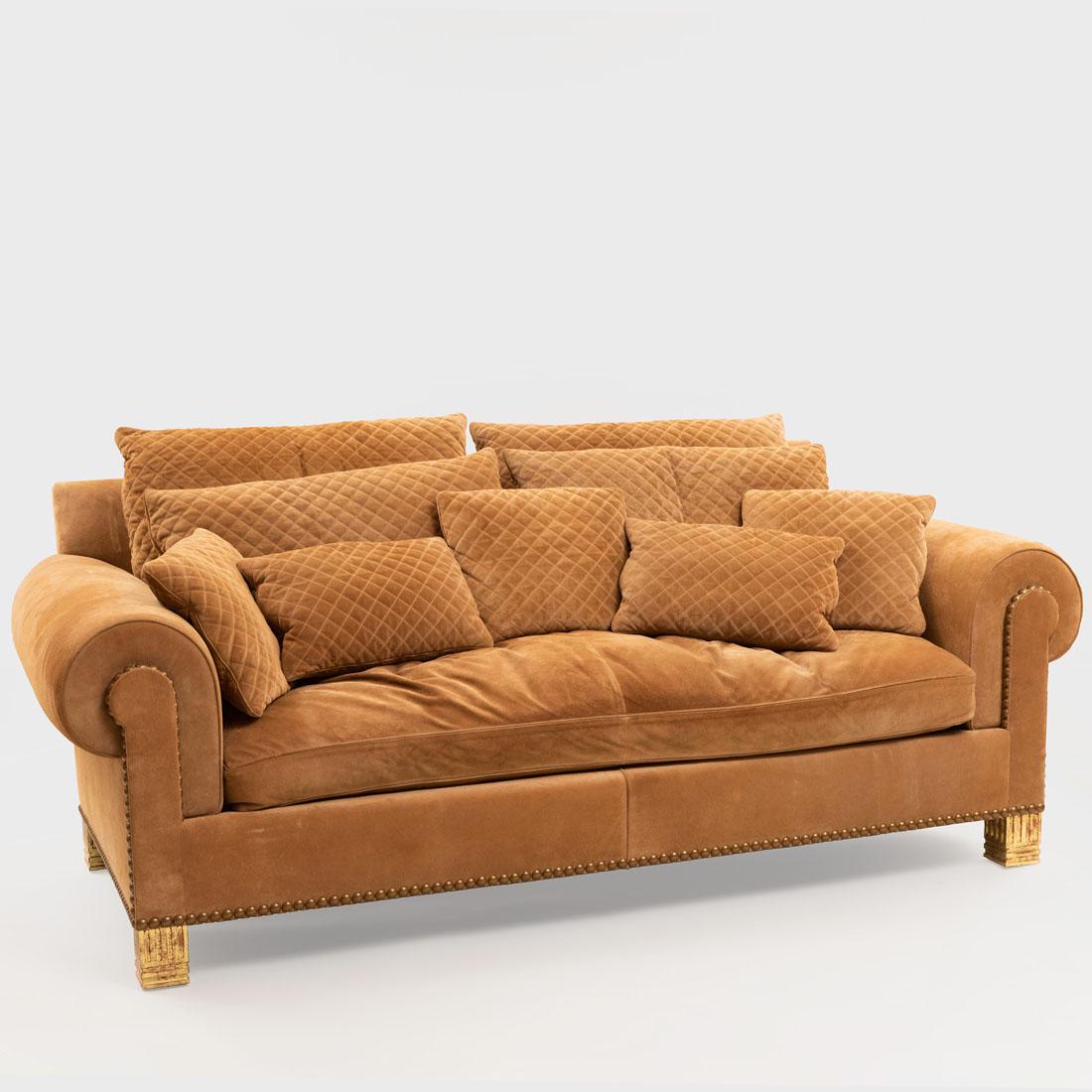 Modern Brass-Studded Suede 'Chanel' Sofa: Modern Brass-Studded Suede 'Chanel' Sofa Raised on giltwood feet and fitted with nine loose cushions. 32 x 80 x 41 in.