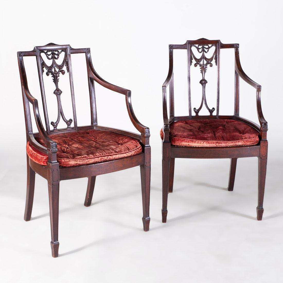 Pair of George III Carved Mahogany and Caned Armchairs: Pair of George III Carved Mahogany and Caned Armchairs Each fitted with a loose cushion. 36 3/4 x 21 x 21 in. Property from the Repository of a Distinguished Businessman