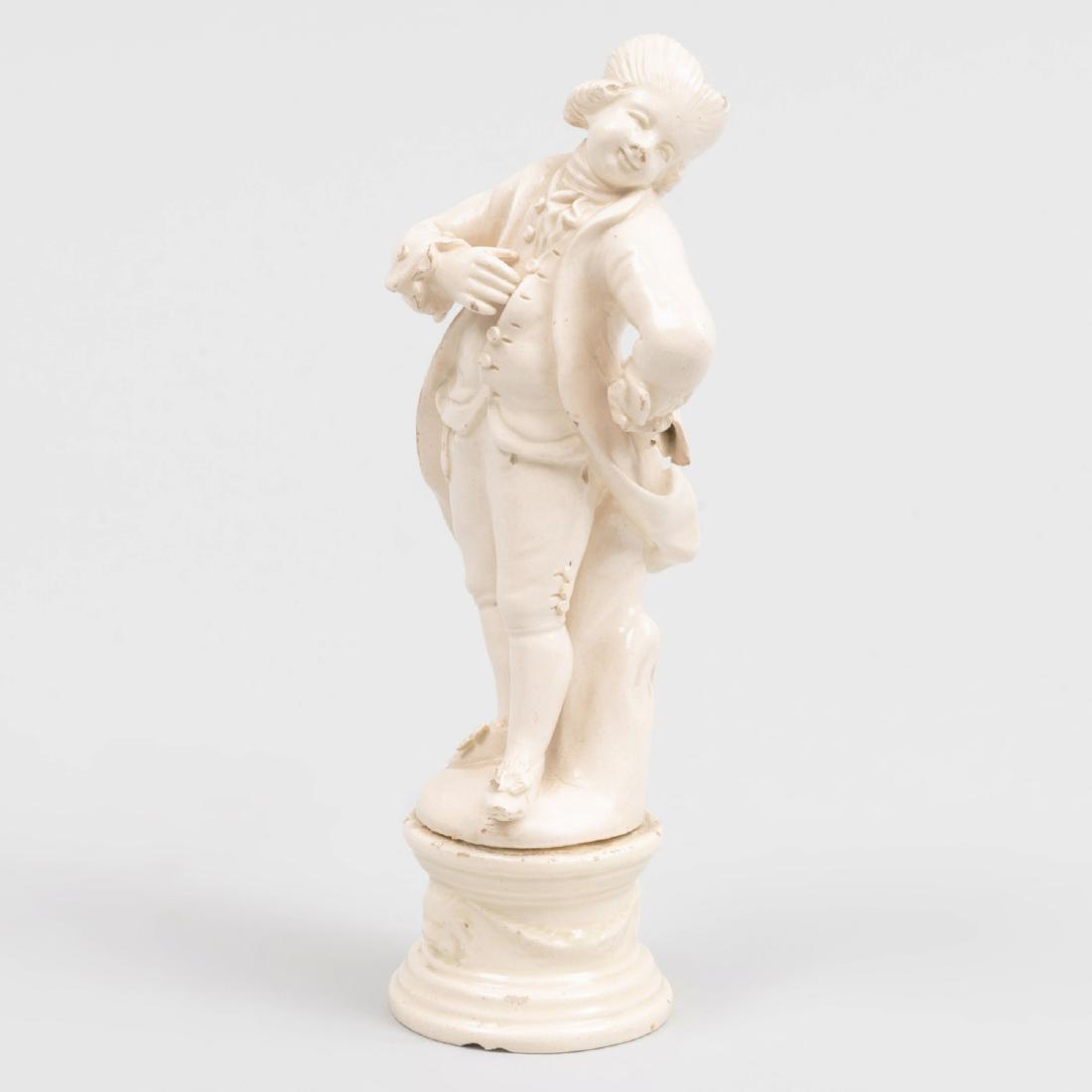 French Creamware Figure of a Dandy: French Creamware Figure of a Dandy 6 in. high.