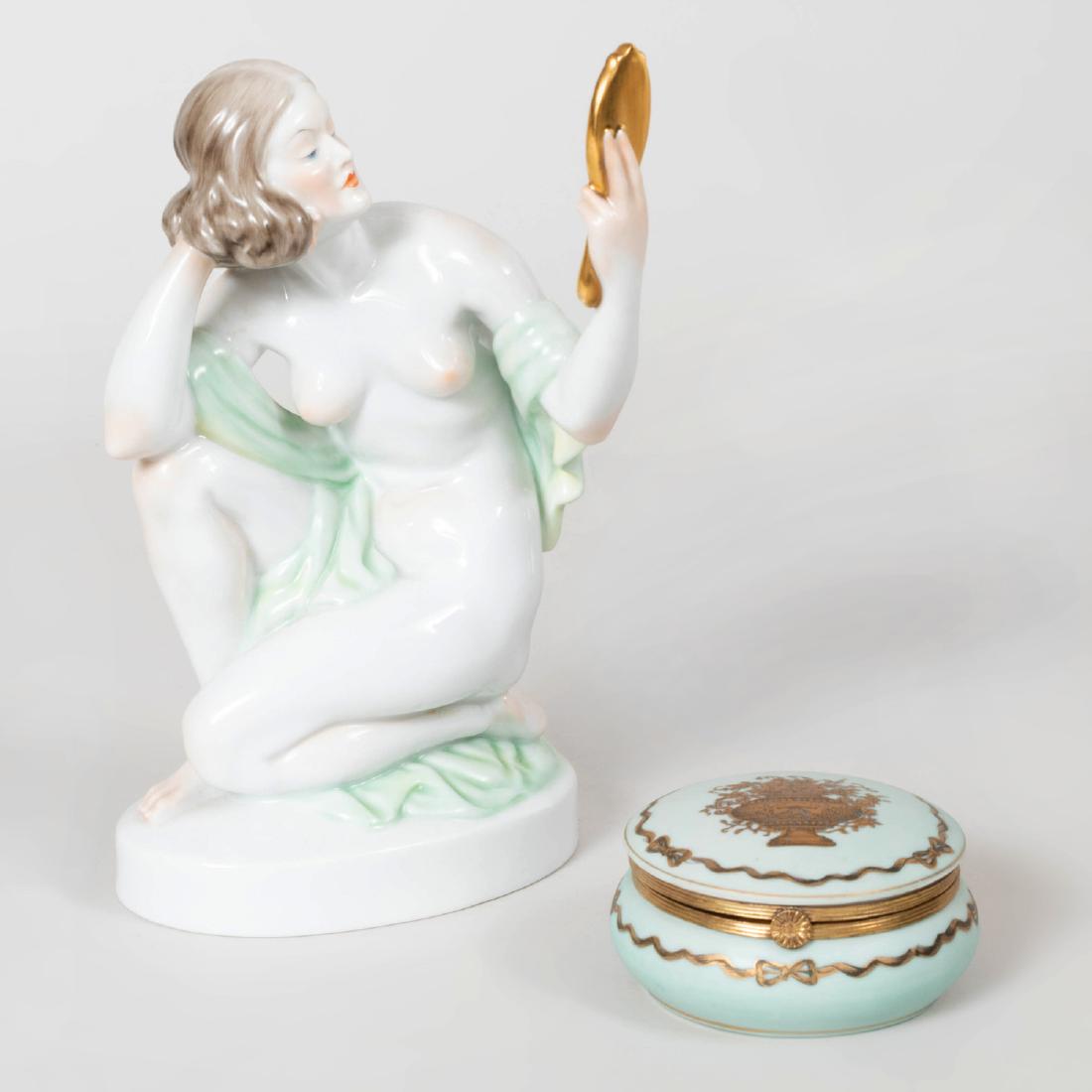 Herend Porcelain Figure of Woman with Limoges Porcelain: Herend Porcelain Figure of Woman with Limoges Porcelain Box and Cover The figure with blue stamped mark, the box with gilt mark. The figure 9 1/2 in. high.