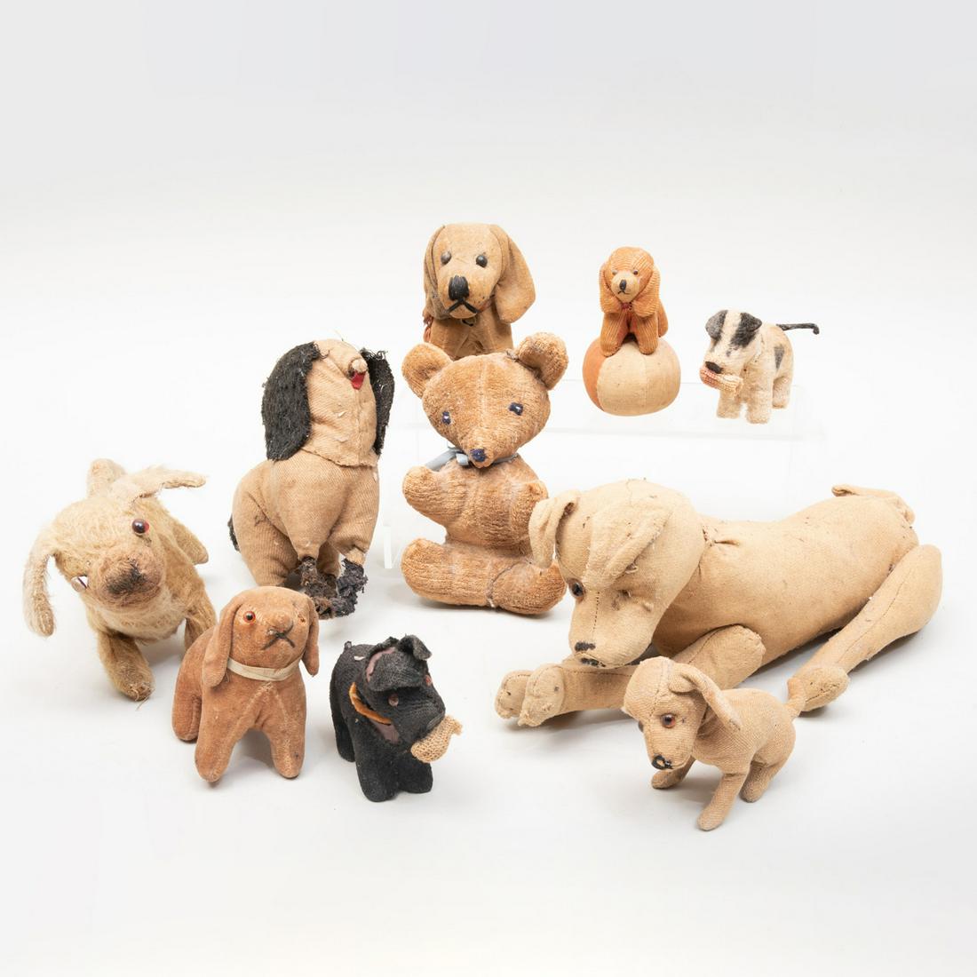 Group of Nine Plush Models of Dogs and a Teddy Bear: Group of Nine Plush Models of Dogs and a Teddy Bear The largest 11 in. long. The Estate of Philip and Kathleen Seibel, Catskill, NY