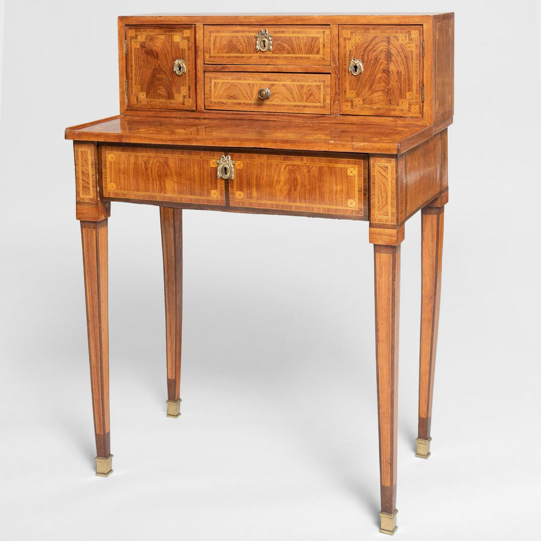 Louis XVI Ormolu-Mounted Kingwood and Tulipwood: Louis XVI Ormolu-Mounted Kingwood and Tulipwood Parquetry Bonheur du Jour The superstructure fitted with two short drawers flanked by two doors enclosing six short drawers, above the writing surface a