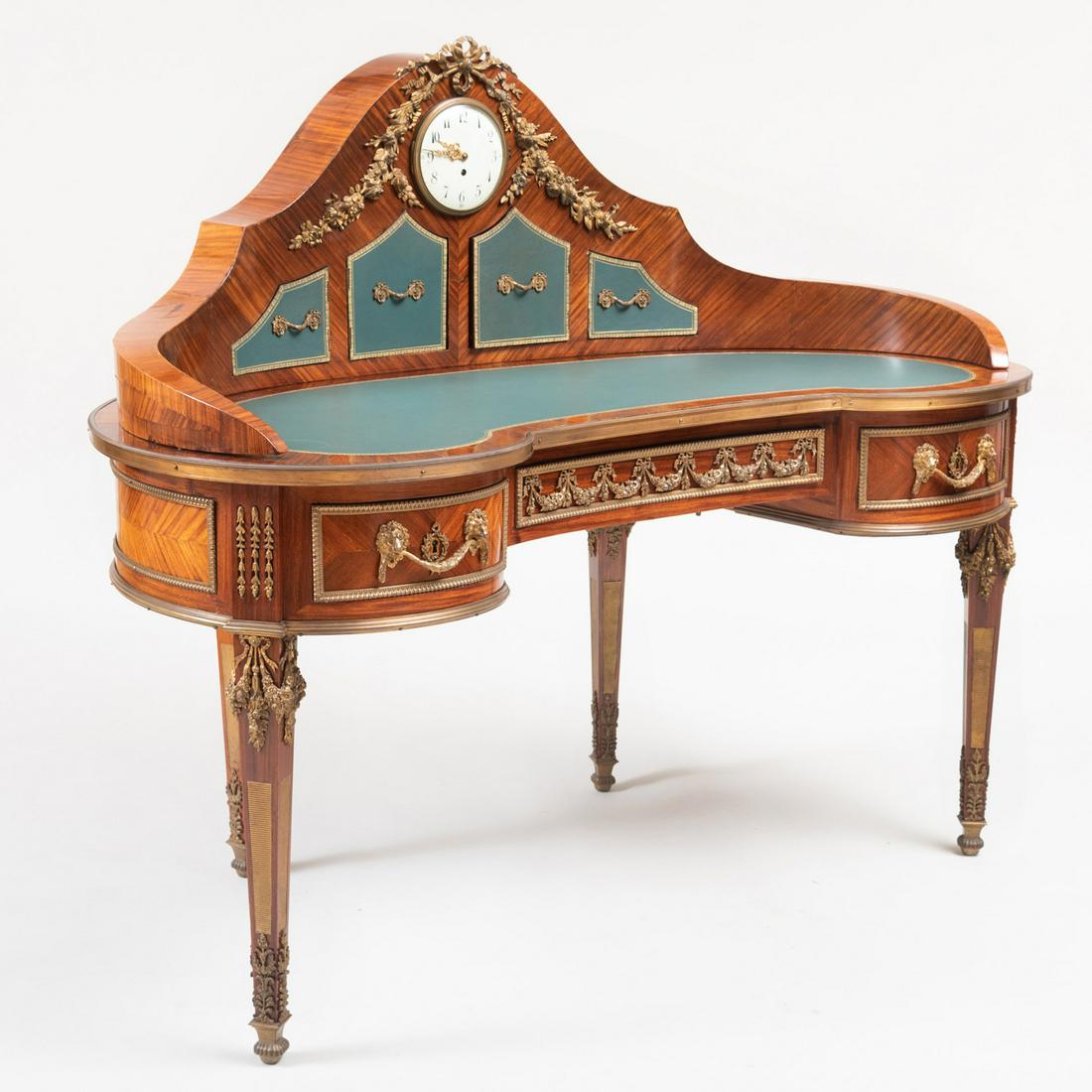 Unusual Louis XVI Style Ormolu-Mounted Kingwood: Unusual Louis XVI Style Ormolu-Mounted Kingwood Kidney-Shaped Desk with Cartonnier The cartonnier centrally fitted with a clock and four leather-mounted doors, above the leather-lined writing surface,