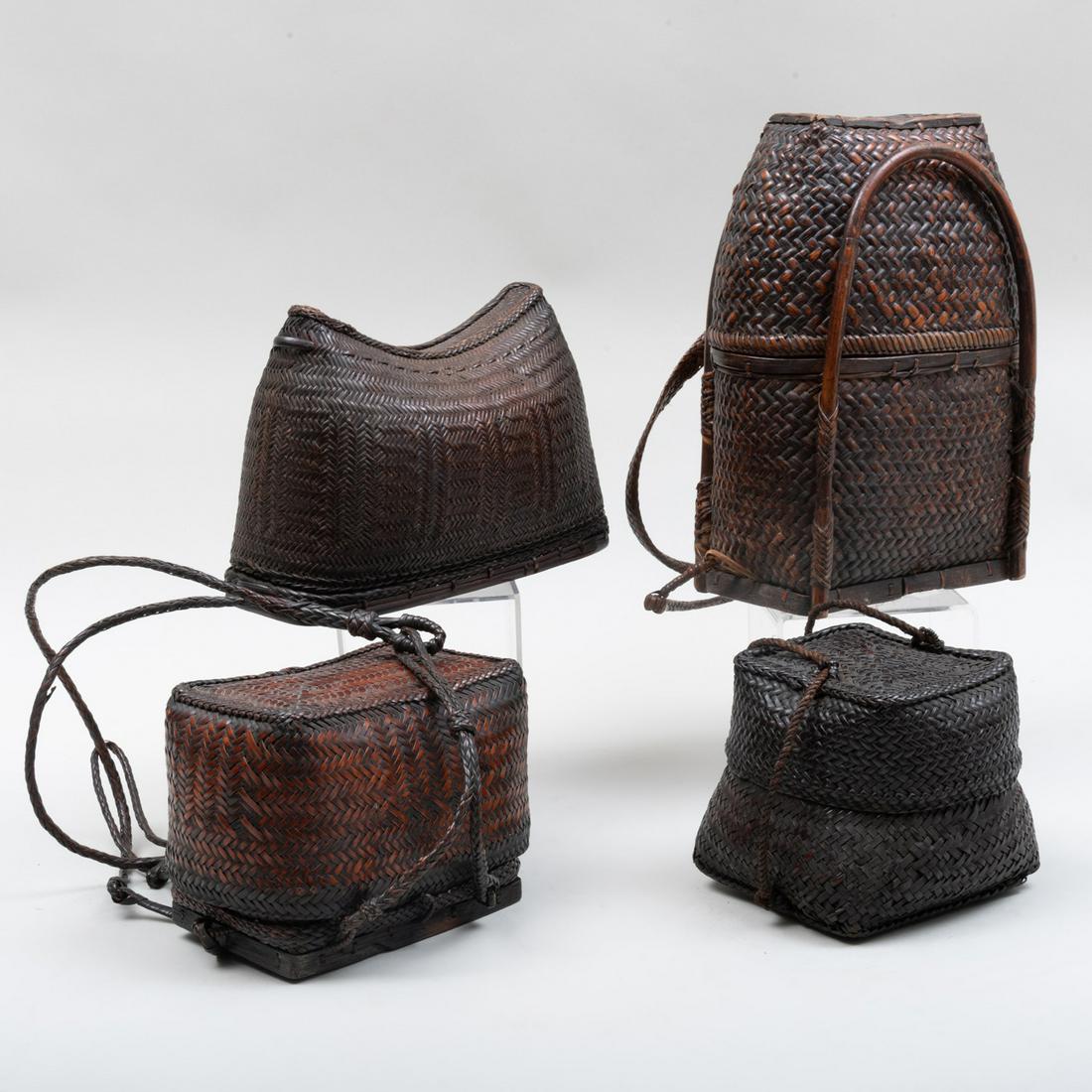 Group of Three Southeast Asian Woven Covered Baskets,: Group of Three Southeast Asian Woven Covered Baskets, probably Ifugao, Philippines Two baskets with handles. Together with a Ifuago Rattan Woven Backpack, Philippines. Largest: 14 3/4 x 10 1/2 x 6 1/2