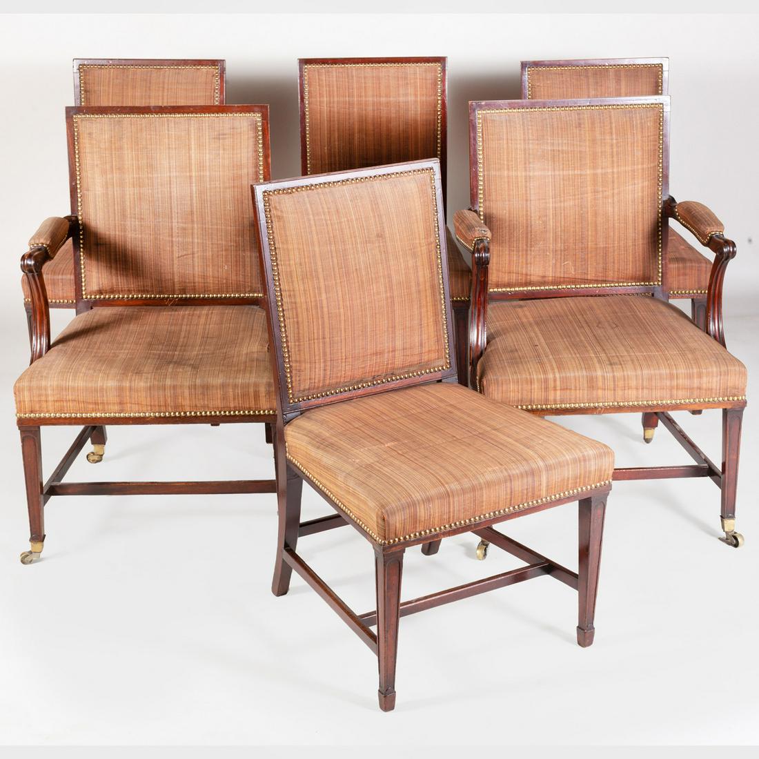Set of Six George III Mahogany Dining Chairs: Set of Six George III Mahogany Dining Chairs Comprising two armchairs with casters and four side chairs. Armchairs: 36 x 23 1/4 x 24 3/4 in. Sold Christie's, NY, June 27, 2009, lot 58.