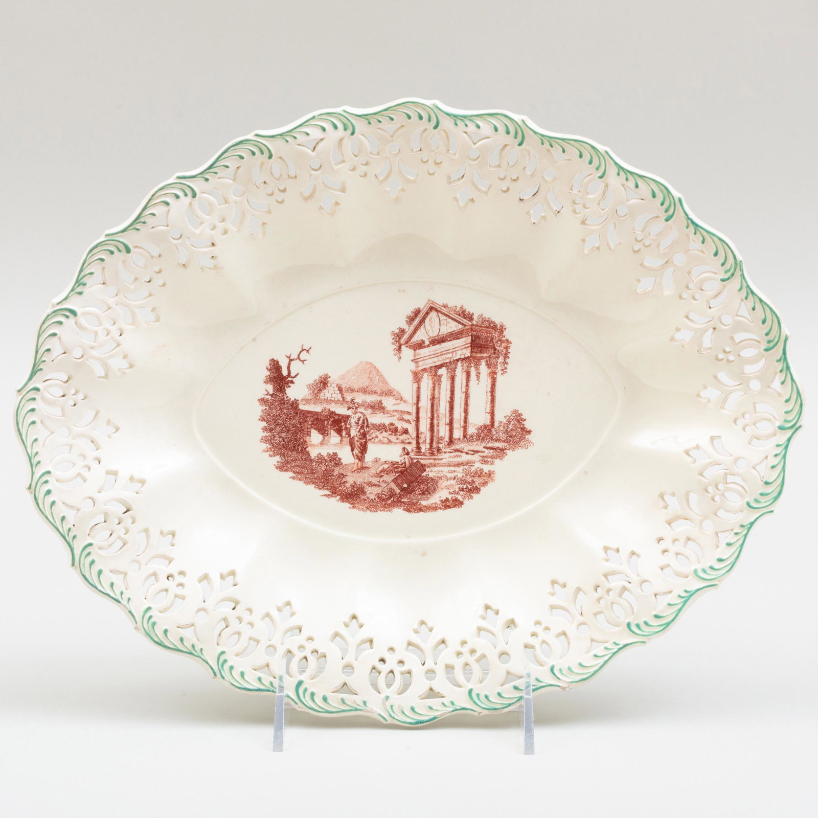 Wedgwood Creamware Transfer Printed Oval Dish with: Wedgwood Creamware Transfer Printed Oval Dish with Reticulated Rim Impressed lowercase mark; transfer printed in red with 'Corinthian Ruins' after Jean David Le Roy for Robert Sayer. 12 in. wide. J. L