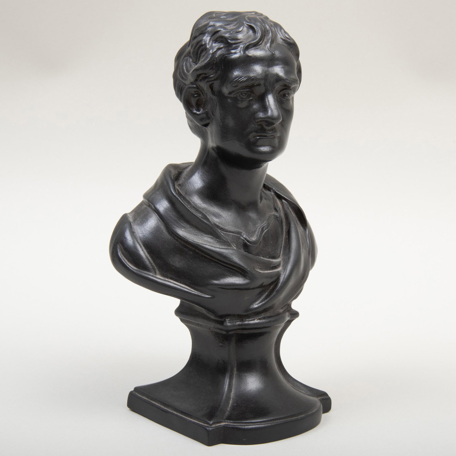 Wedgwood Black Basalt Bust of Sir Isaac Newton: Wedgwood Black Basalt Bust of Sir Isaac Newton Impressed mark. 8 3/4 in. high. Seal Simons, Philadelphia, 1972. Label for the Starr Collection no. 213.