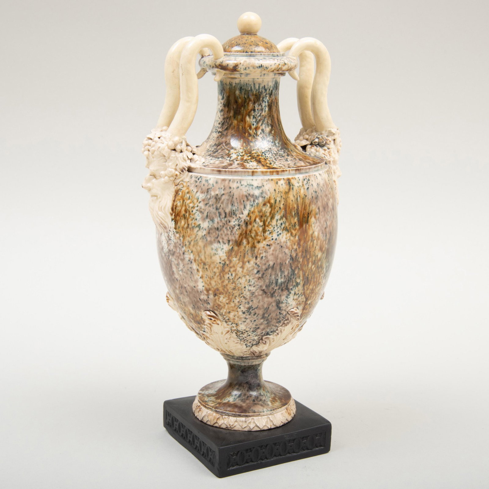 Wedgwood & Bentley Creamware 'Porphyry' Vase and Cover: Wedgwood & Bentley Creamware 'Porphyry' Vase and Cover Impressed lowercase mark; affixed on either side with a horned Bacchus-mask handle. 8 1/2 in. high. Christies, London, April 21, 1982. Label for