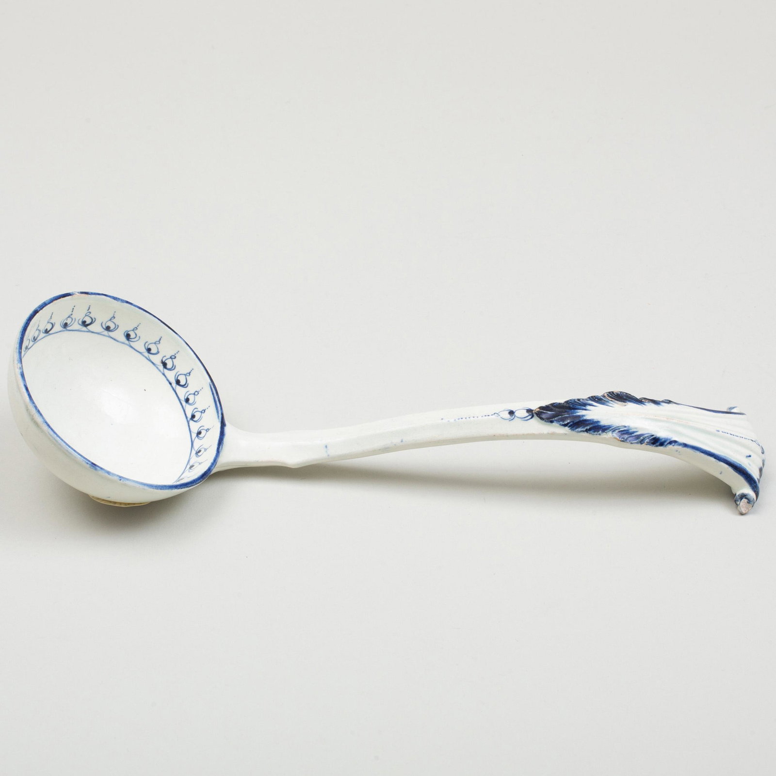 Wedgwood Pearlware Blue and White Ladle: Wedgwood Pearlware Blue and White Ladle Impressed mark. 10 1/4 in. long. Label for Theodore and Rosalind Spak Collection, 1984. Label for the Starr Collection no. 429.
