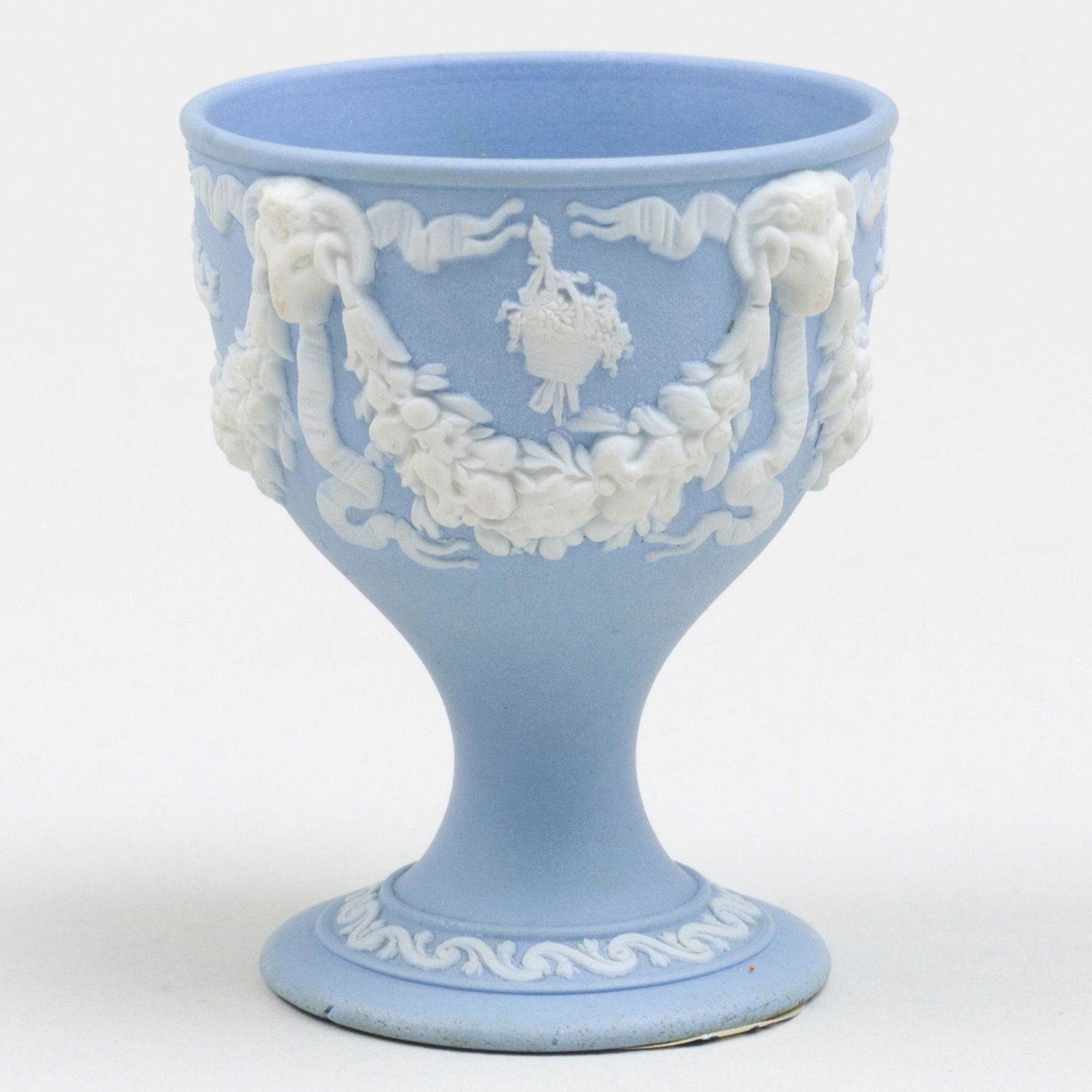Wedgwood Blue and White Jasperware Egg Cup: Wedgwood Blue and White Jasperware Egg Cup Impressed mark. 2 1/4 in. high. Jo-Ann Blum, NY, 1973. Label for the Hammond Museum 1984. Label for the Starr Collection no. 216.