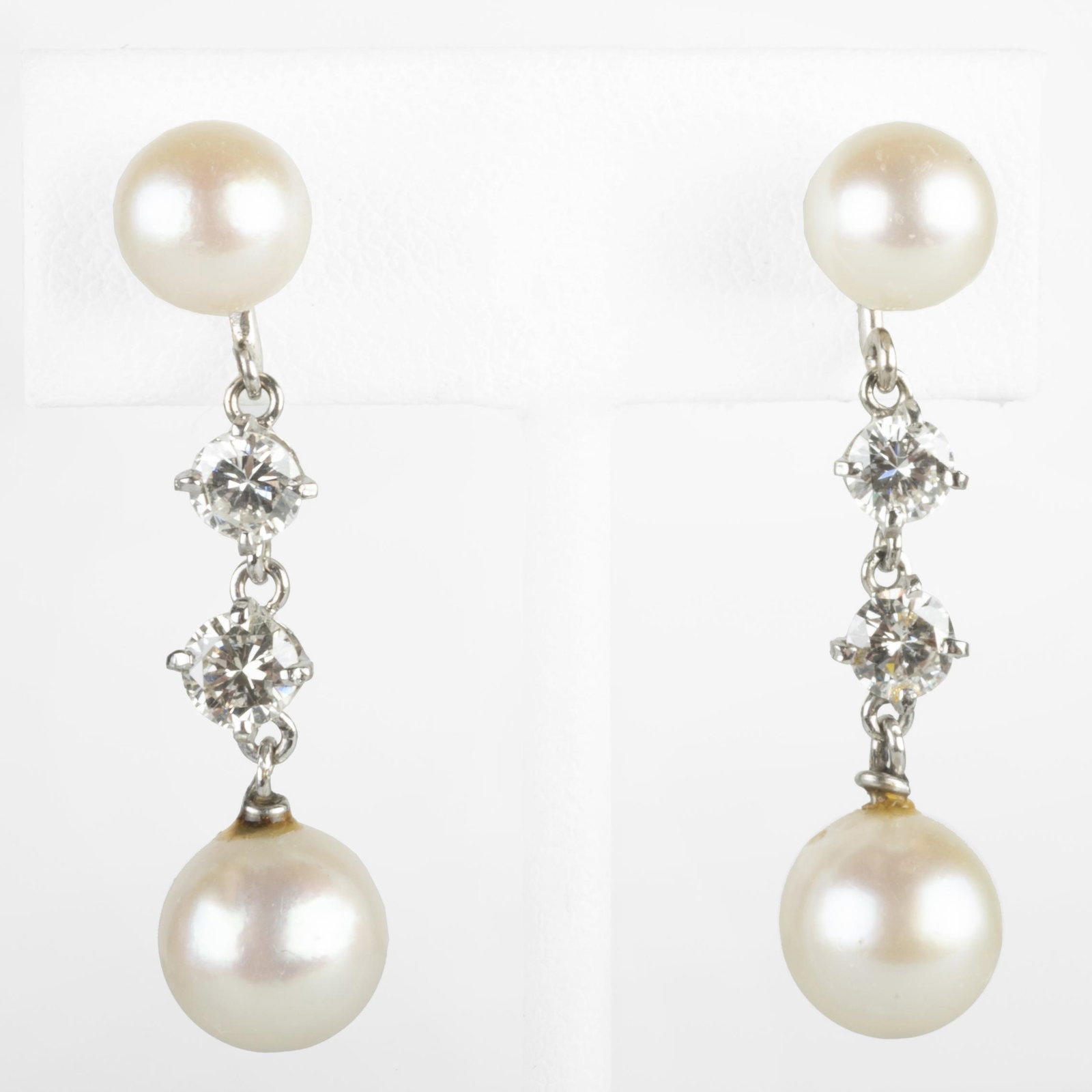 Platinum, Pearl and Diamond Drop Earrings: Platinum, Pearl and Diamond Drop Earrings Pearls measuring approx. 7.4mm to 8.8mm 1 1/4 in., 3.5 dwts. p> Property form the Estate of Mrs. Stanley Krammer, Manhattan.