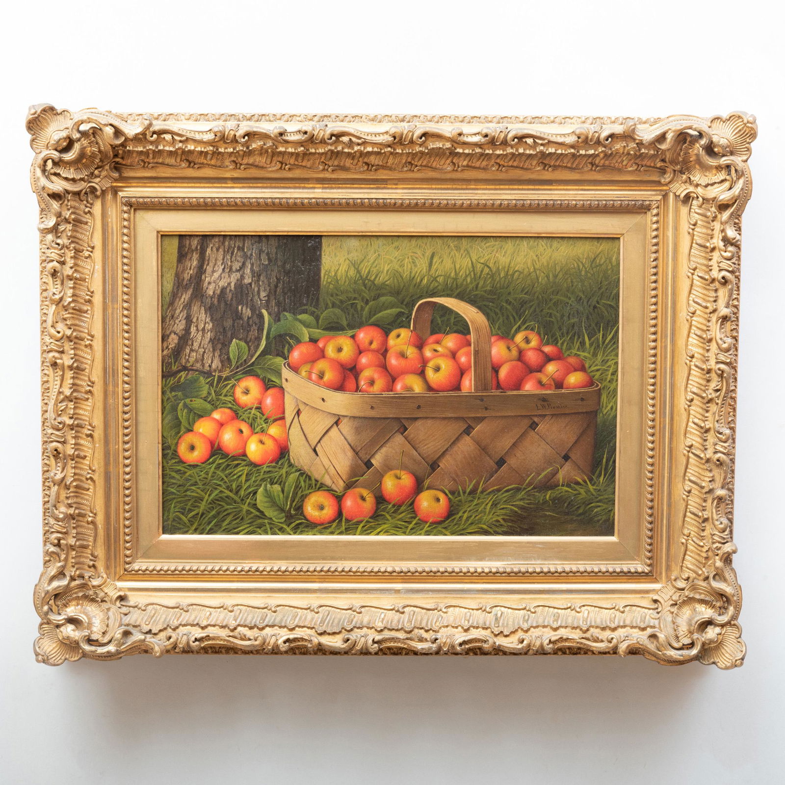 Levi Wells Prentice (1851-1935): Basket of Apples: Levi Wells Prentice (1851-1935): Basket of Apples Oil on canvas, signed 'L. W. Prentice' center right. 12 x 18 in., 21 x 26 1/2 in. (frame). p>