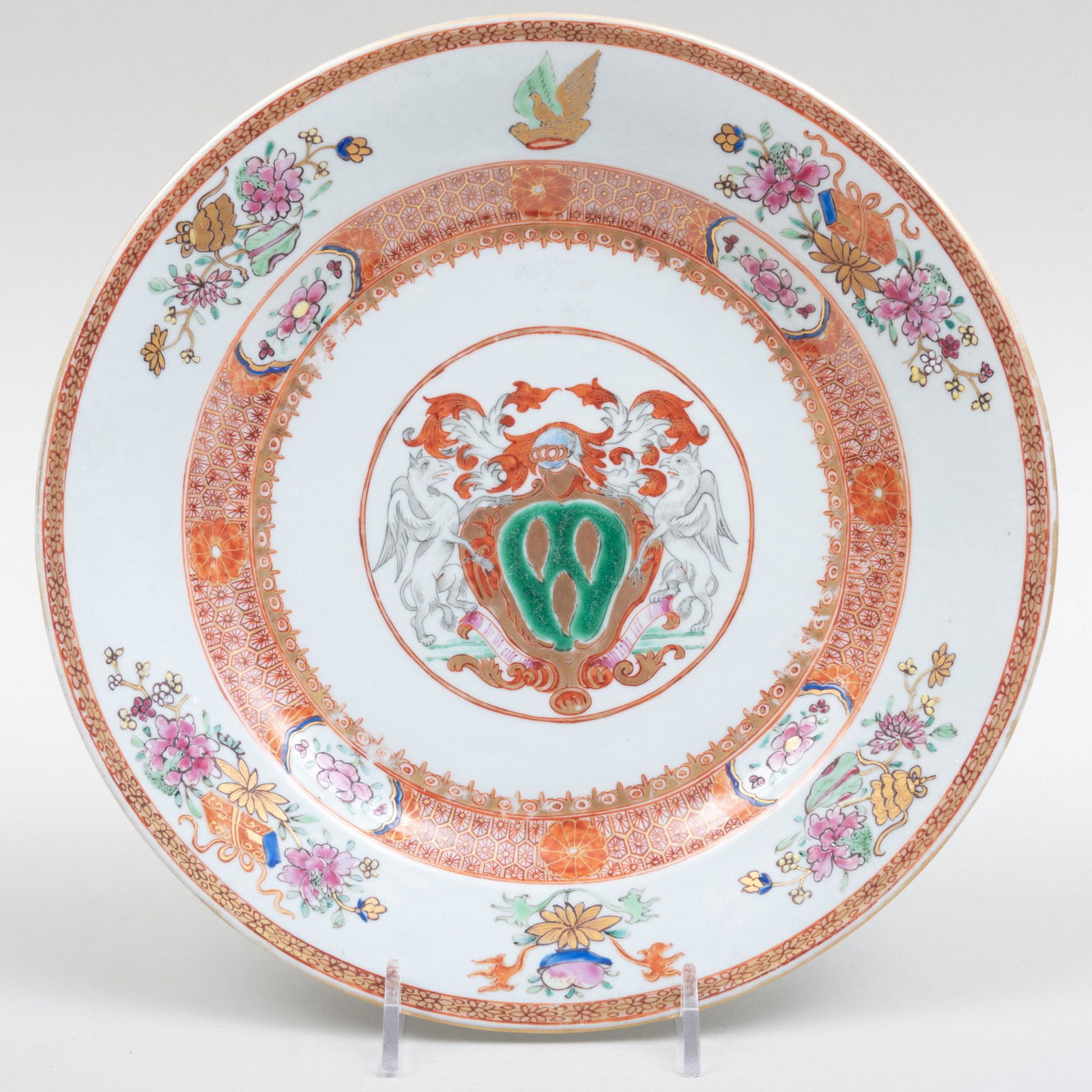 Chinese Export Dinner Plate Decorated with the Armorial: Chinese Export Dinner Plate Decorated with the Armorial of the Woodward Family 9 in. diam. Note: For a similar example see Howard, David, Chinese Armorial Porcelain, 1974, D4, pg. 212, ill. p>