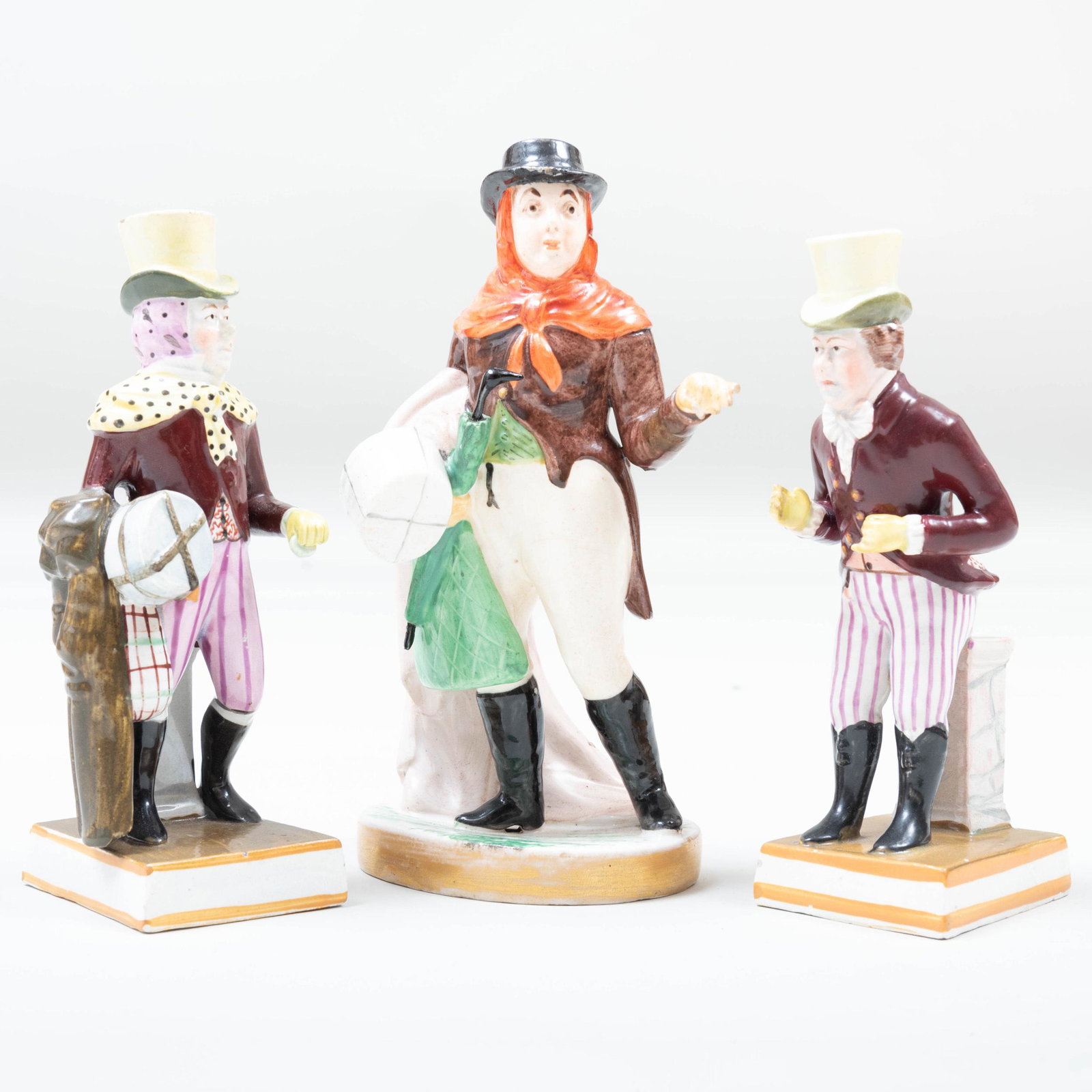 Pair of Enoch Wood Pearlware Theatrical Figures of John: Pair of Enoch Wood Pearlware Theatrical Figures of John Liston and a Rockingham Theatrical Figure Pair of figures with impressed circle marks, the single figure with incised no. '11'. The largest 7 in