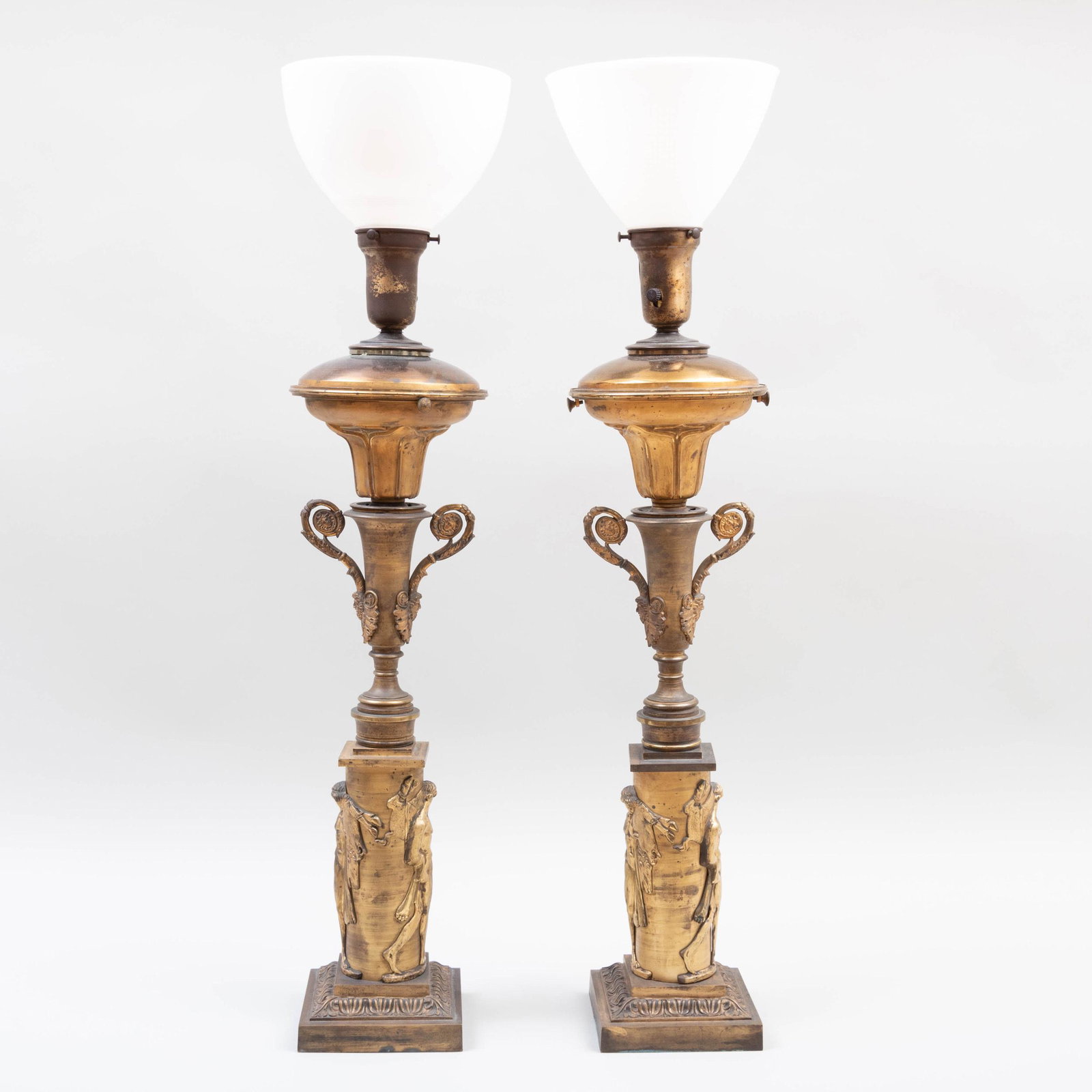 Pair of Napoleon III Ormolu Oil Lamps: Pair of Napoleon III Ormolu Oil Lamps 29 in. high. p>