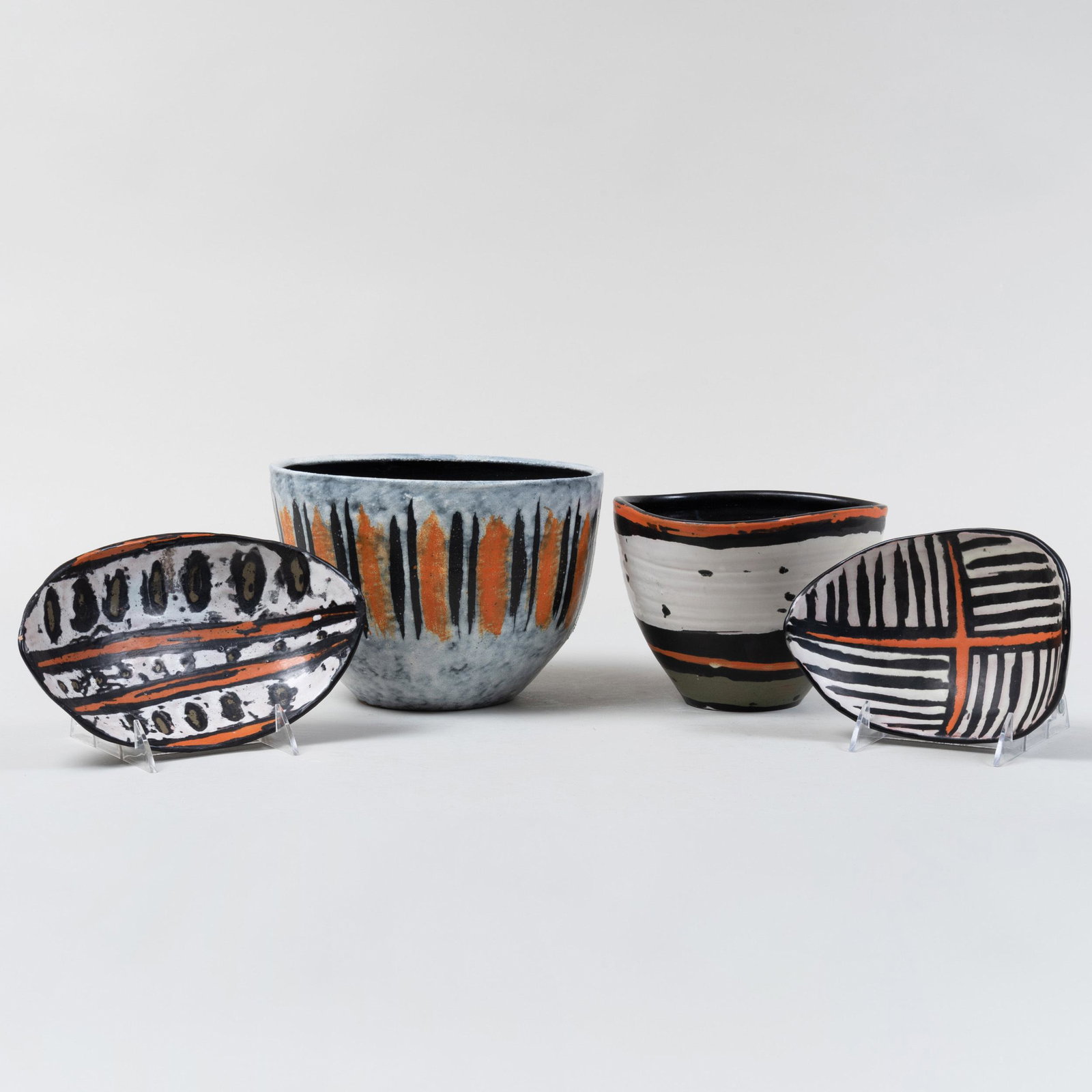 Group of Four Gorka Livia Glazed Earthenware Vessels: Group of Four Gorka Livia Glazed Earthenware Vessels Signed 'Gorka Livia' or with artist monogram. Comprising: Two navette form dishes Two conical bowls The largest 6 1/4 x 8 3/4 in. diam. Literature: