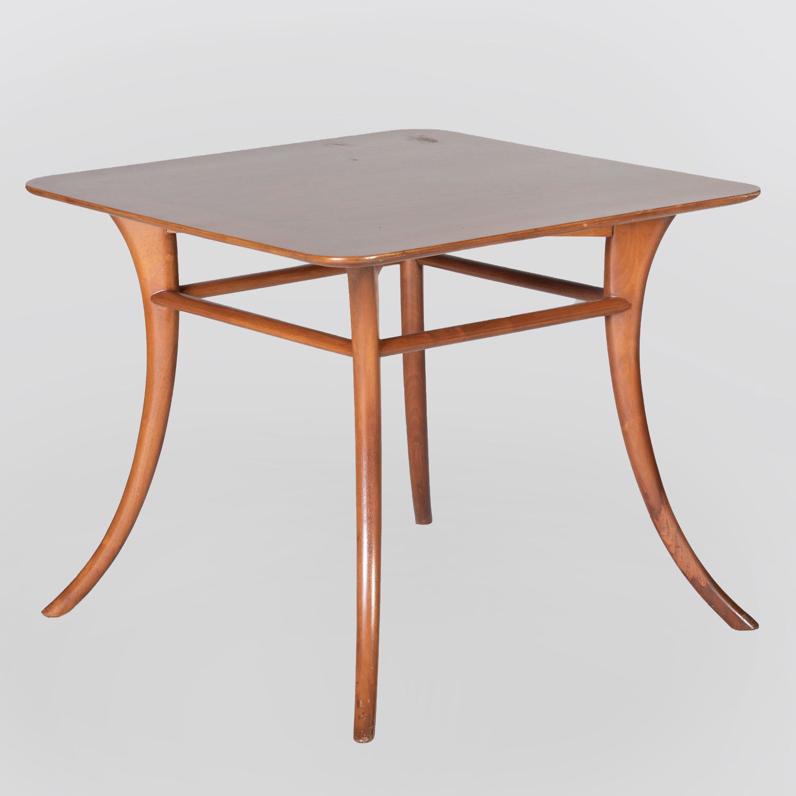 Walnut Side Table in the Manner of Robsjohn-Gibbings: Walnut Side Table in the Manner of Robsjohn-Gibbings 20 1/2 x 24 x 24 in. Property from the Estate of Jan Cowles
