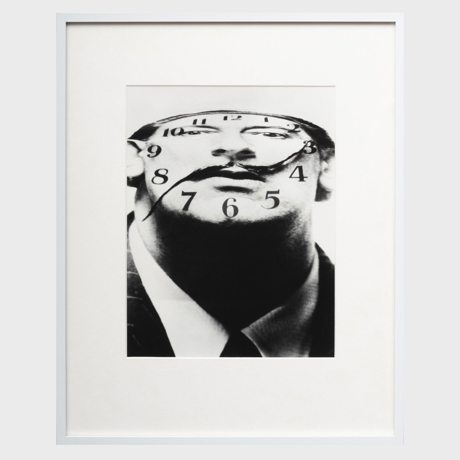 Philippe Halsman (1906-1979): Dali Clockface: Philippe Halsman (1906-1979): Dali Clockface Gelatin silver print, 1953, with the artist's inkstamp and numbered 174/250 on the reverse. 14 x 11 in. (sheet), 20 1/4 x 16 1/4 in. (frame).