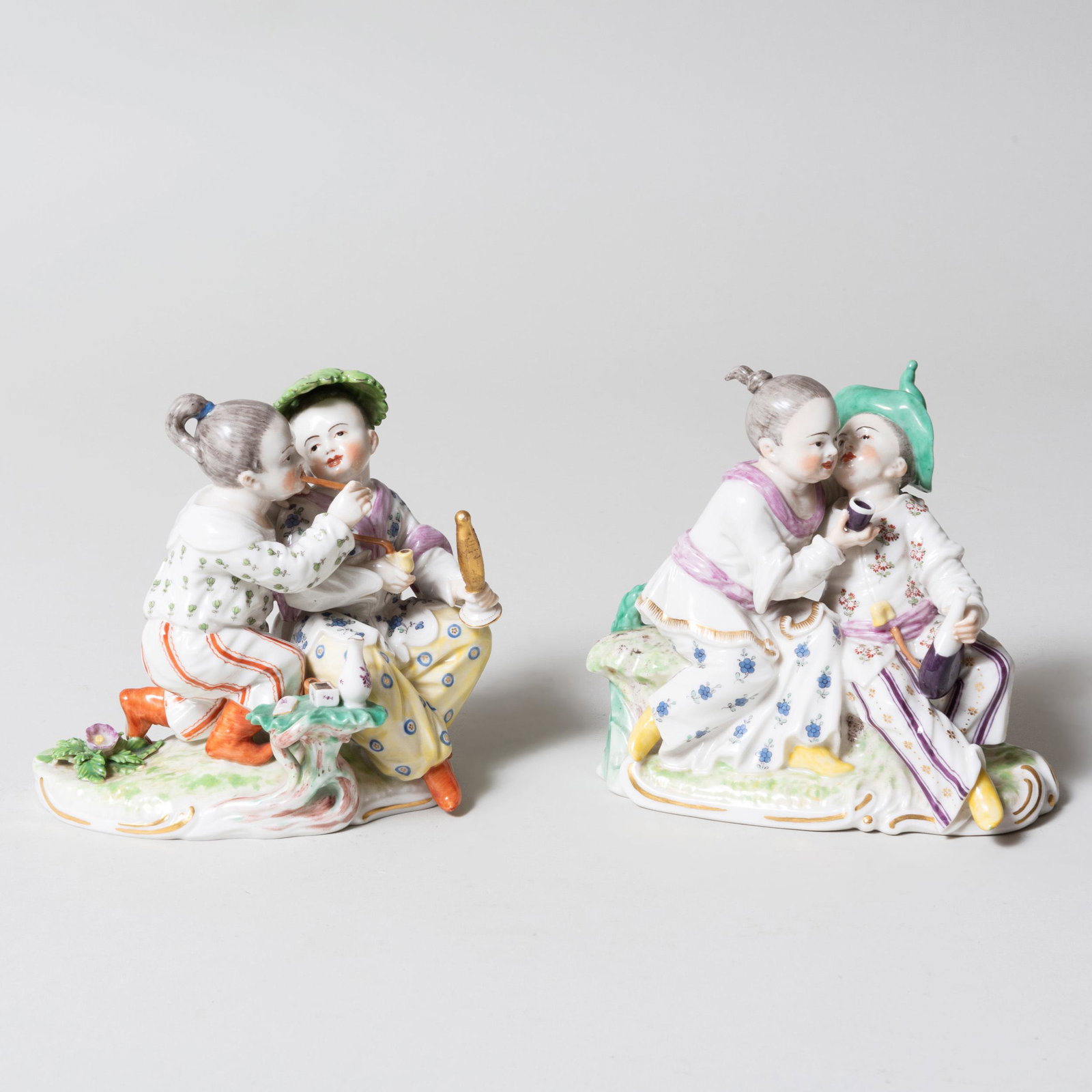 Pair of Frankenthal Porcelain Chinoiserie Groups of: Pair of Frankenthal Porcelain Chinoiserie Groups of Children Each unglazed underside marked with blue crown and initials 'TC' and numbered 1954. With the impressed shield mark and 1168 and 1167 and 0.
