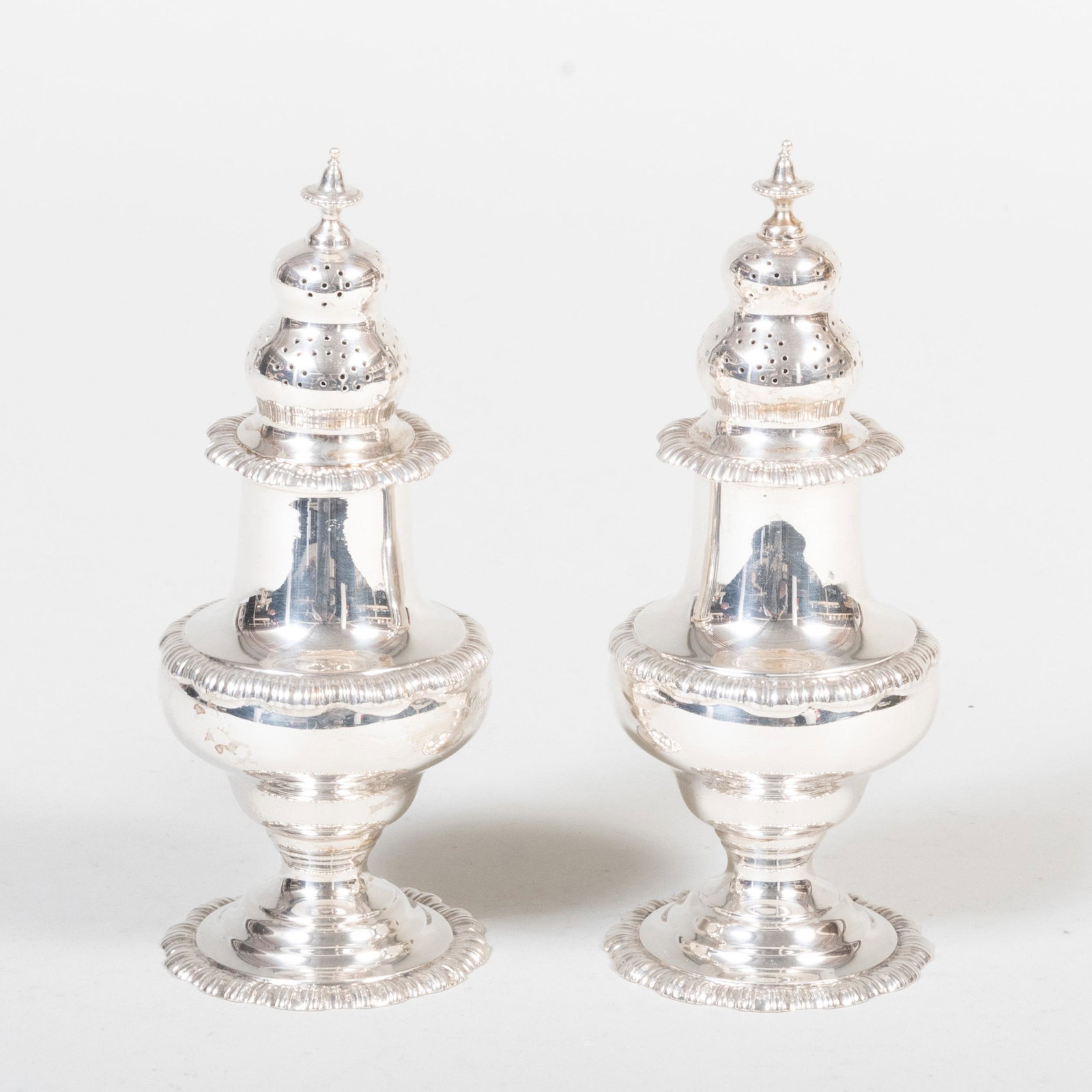 Pair of American Silver Casters: Pair of American Silver Casters Marked 'Sterling'. 7 in. high, 14.6 oz. approx. weight. Property from the Estate of Mrs. C. Douglas Dillon