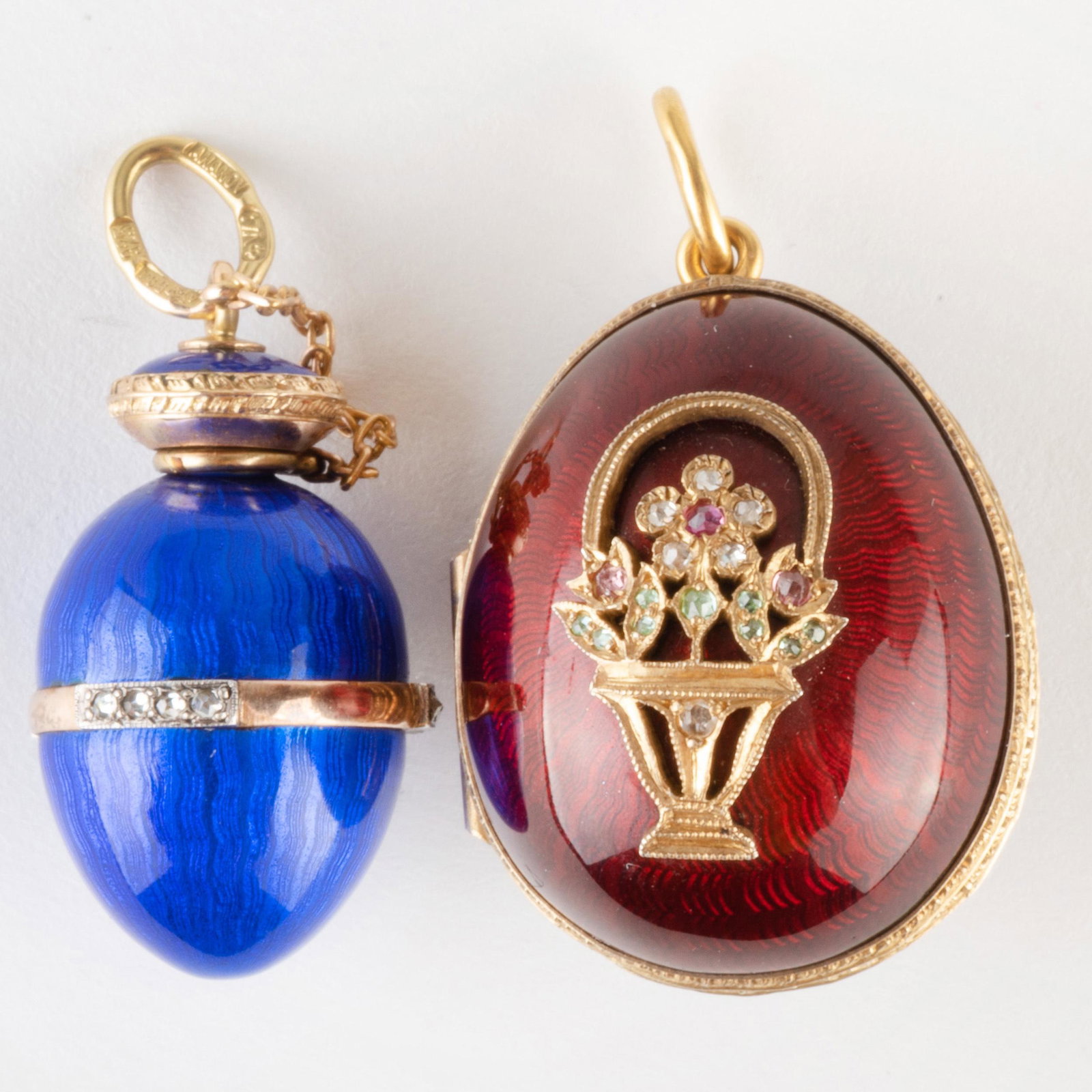Two Russian Ananov 14k Gold, Diamond and Enamel Egg: Two Russian Ananov 14k Gold, Diamond and Enamel Egg Pendants With hallmarks. 3/4 in. and 1 in., 13.4 dwts.