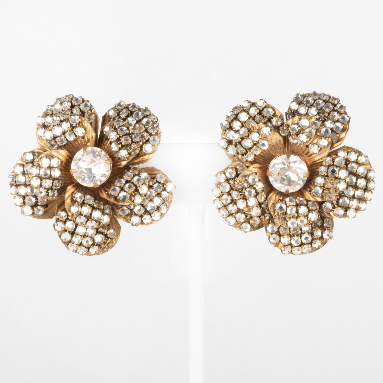 Pair of Miriam Haskell Floral Rhinestone Earclips: Pair of Miriam Haskell Floral Rhinestone Earclips Signed 'Miriam Haskell'. 1 1/2 in. diam.