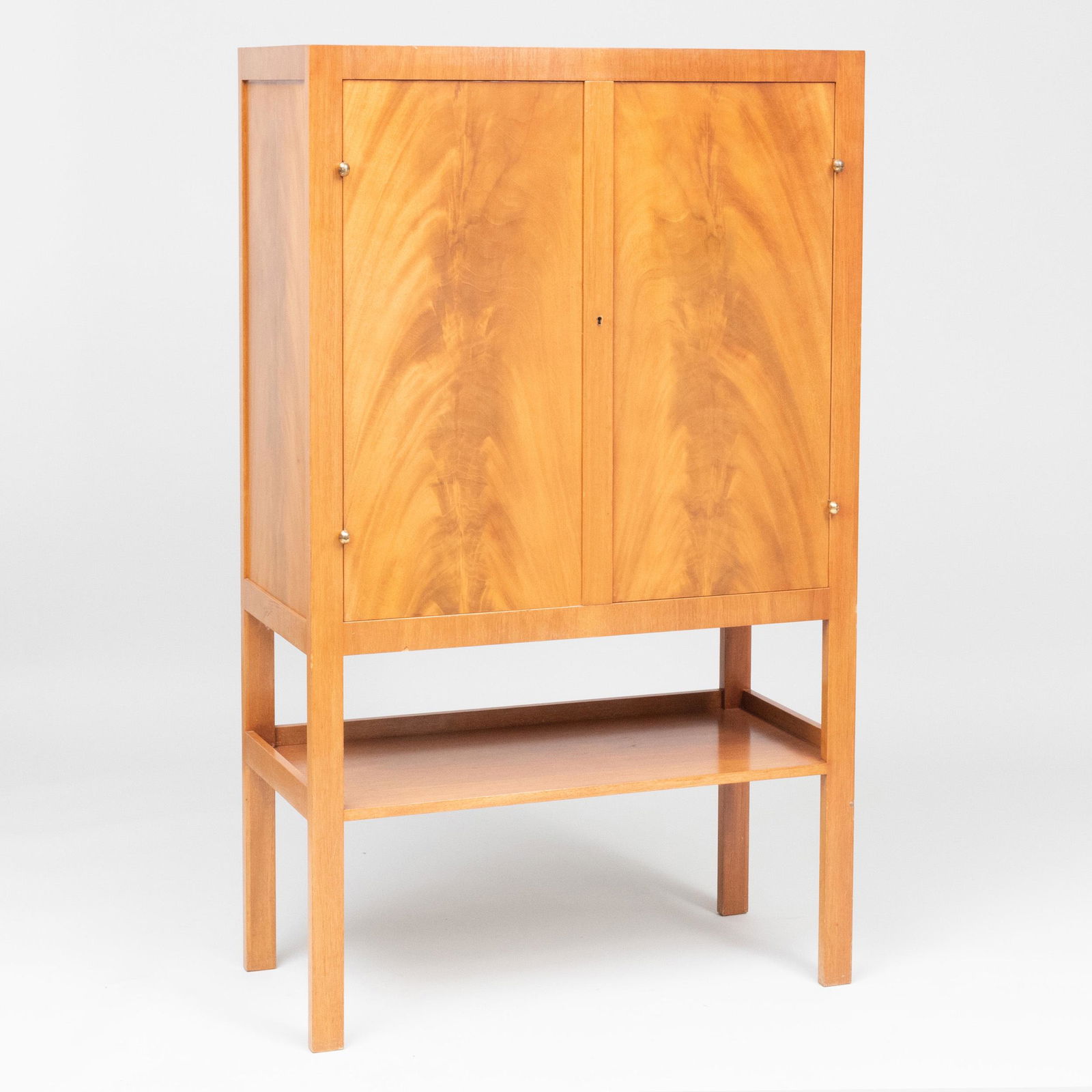 Josef Frank Mahogany Double Door Side Cabinet: Josef Frank Mahogany Double Door Side Cabinet The interior fitted with shelves. 4 ft. 9 in. x 35 1/2 x 17 1/4 in.
