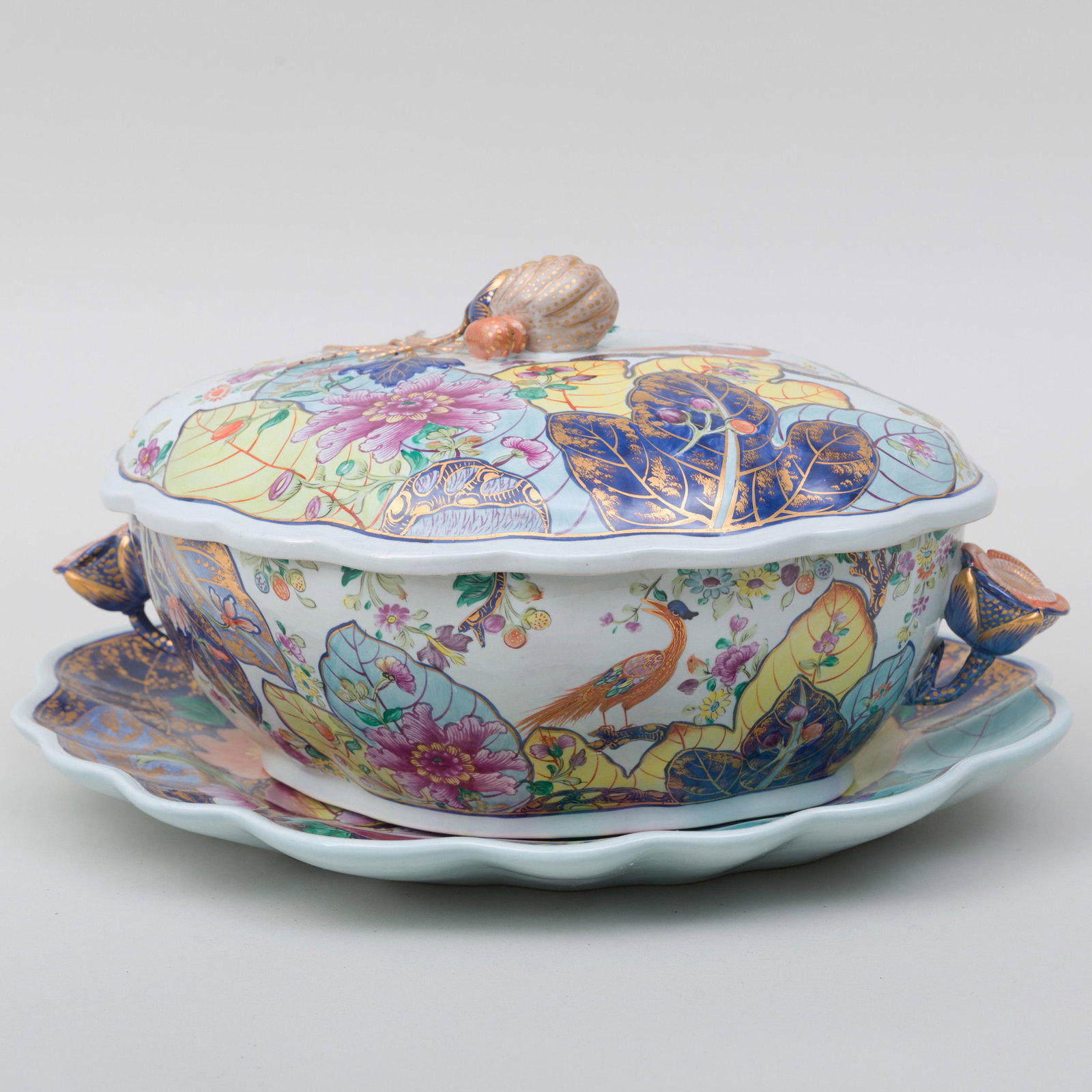 Mottahedeh Porcelain Tureen, Cover and Underplate in: Mottahedeh Porcelain Tureen, Cover and Underplate in the 'Tobacco Leaf' Pattern The underplate 14 in. long.