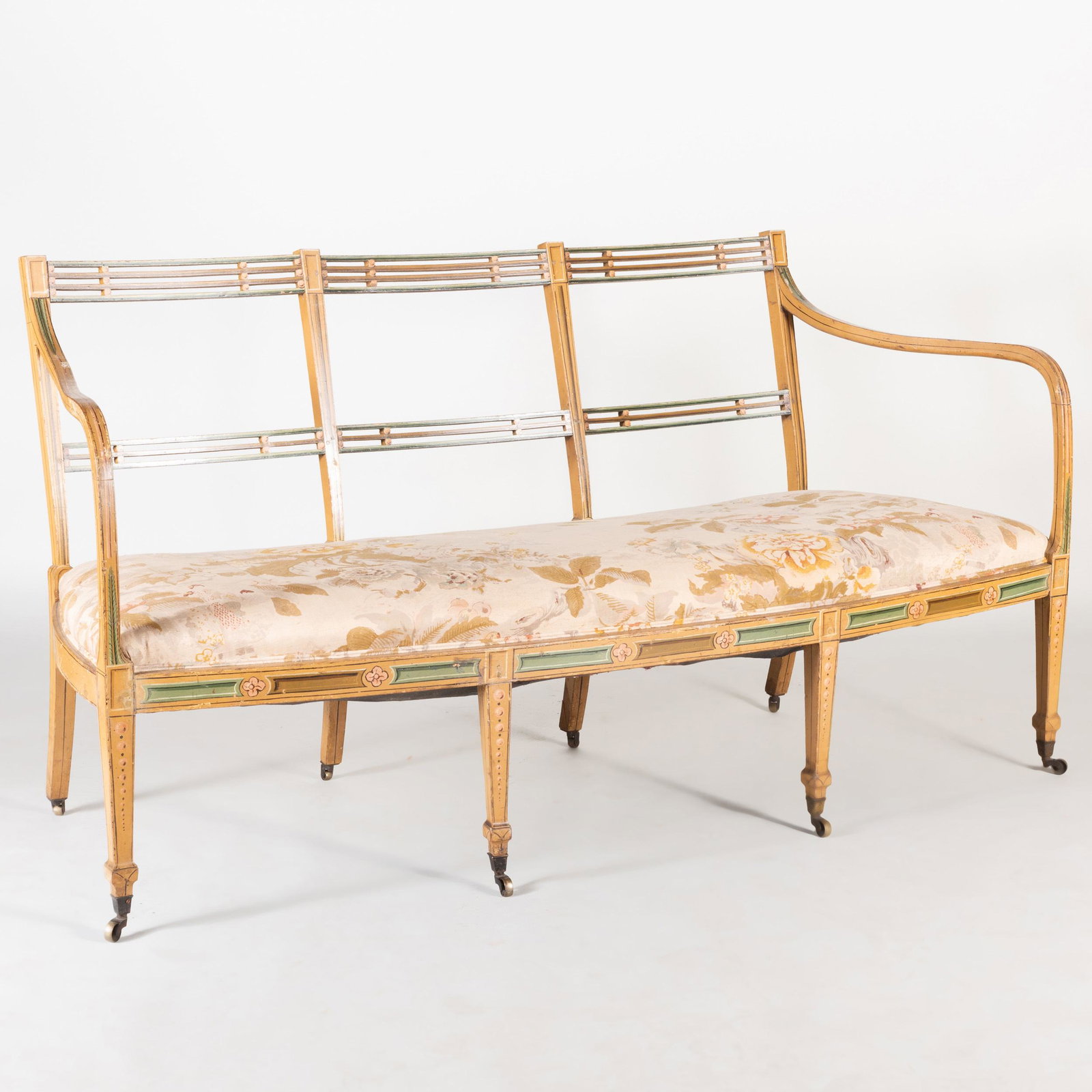 Late George III Painted Settee: Late George III Painted Settee Raised on casters. 36 x 66 1/2 x 26 1/4 in. Height of seat: 18 1/2 in.