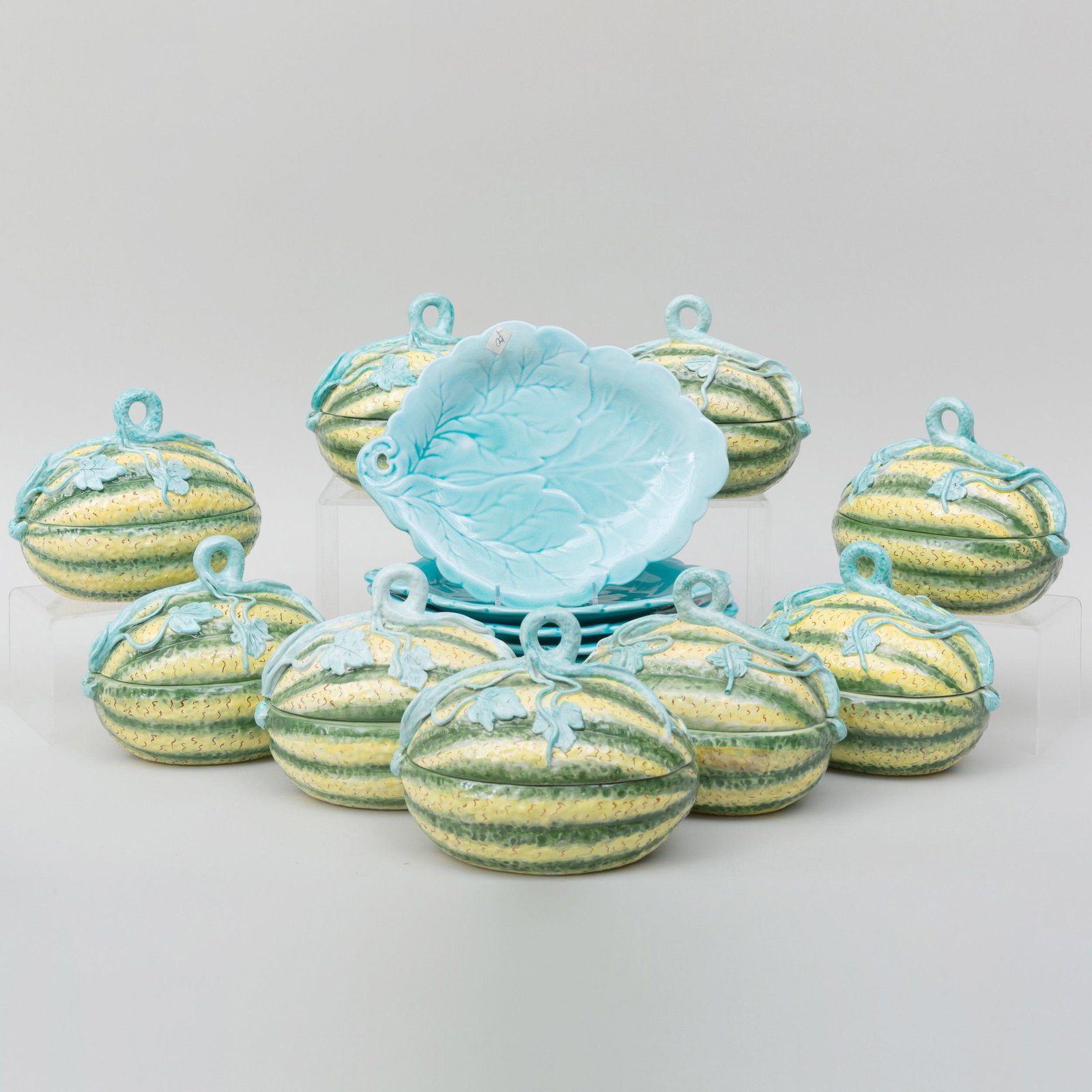 Group of Ten Mottahedeh Porcelain Melon Form Tureens: Group of Ten Mottahedeh Porcelain Melon Form Tureens and Covers and Nine Leaf Form Dishes Various marks. The leaf dishes 10 1/4 in. long.