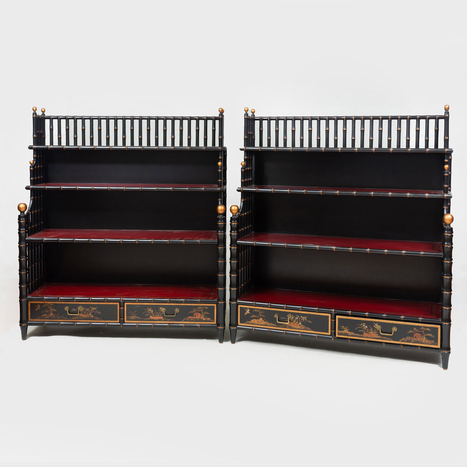 Pair of Regency Style Black and Red Painted Four Tier: Pair of Regency Style Black and Red Painted Four Tier Waterfall Bookcases, Modern Each fitted with two short drawers. 51 1/2 x 46 1/2 x 14 in. Note: Designed by Mario Buatta for Widdicomb, based on lo